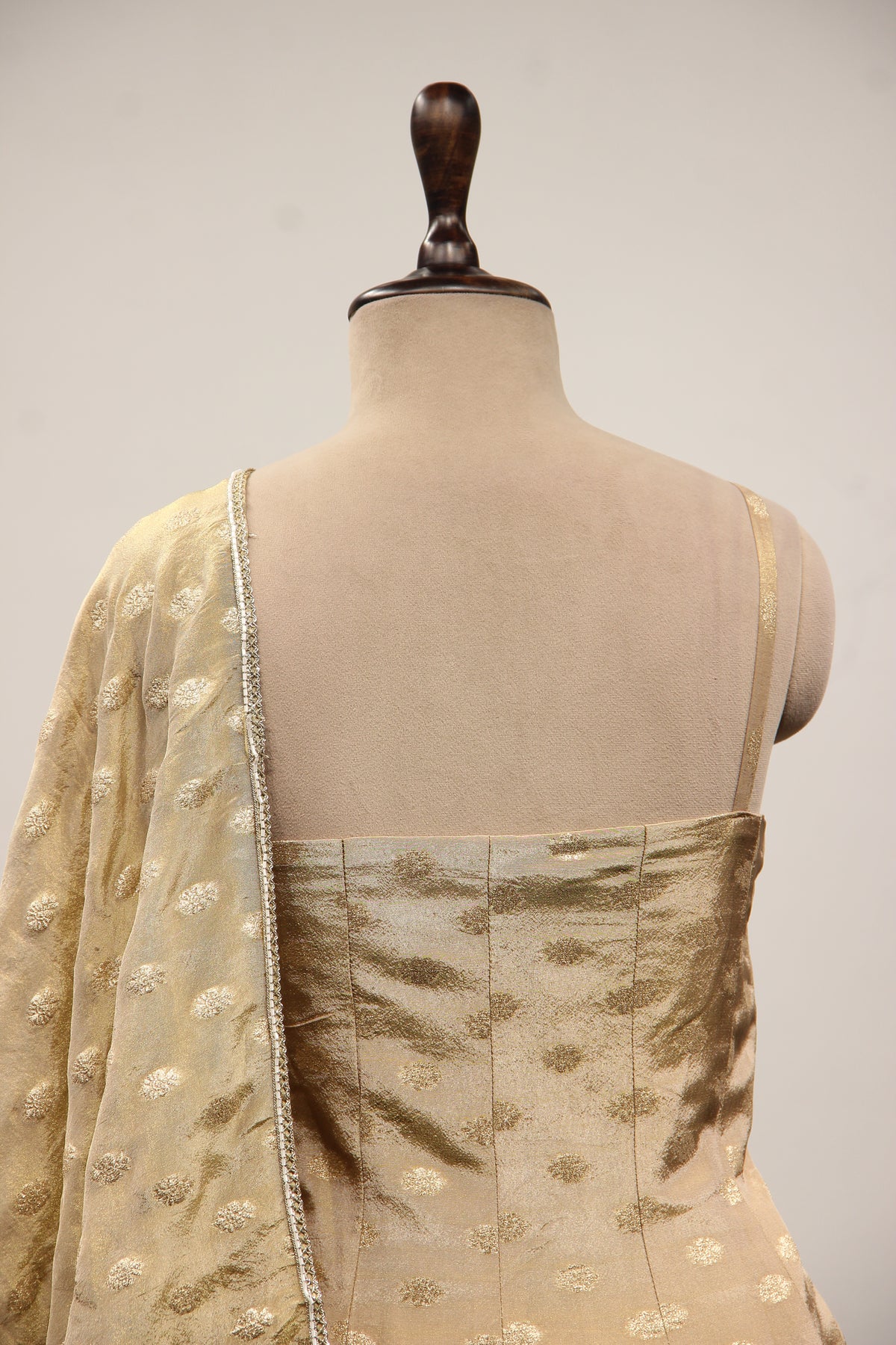 Tissue & Brocade Peplum Suit with Hand Embroidery & Sequin Handwork in Gold – back close-up