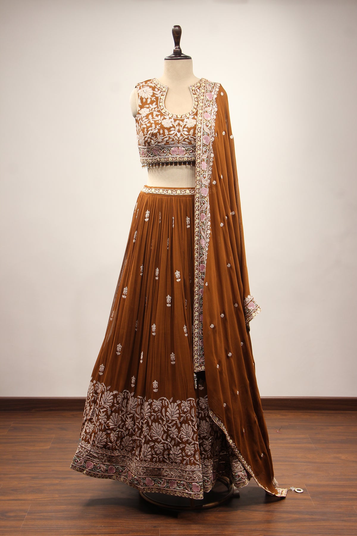 Georgette Lehenga with Resham & Cut Dana Handwork and Beaded Crop Top in Brown – front view