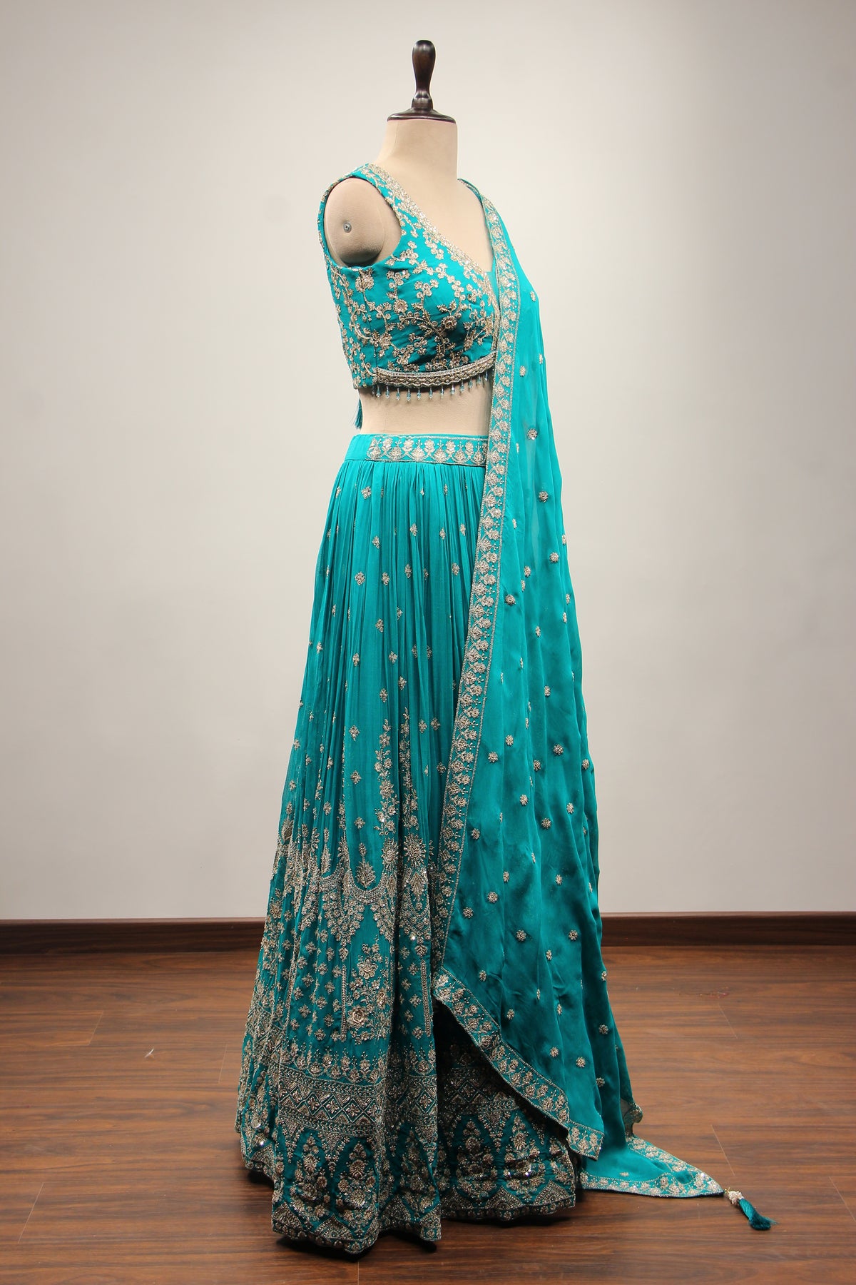 Georgette Lehenga with Zari & Sequin Handwork Plunge V-Neck Crop Top in Green – other side view