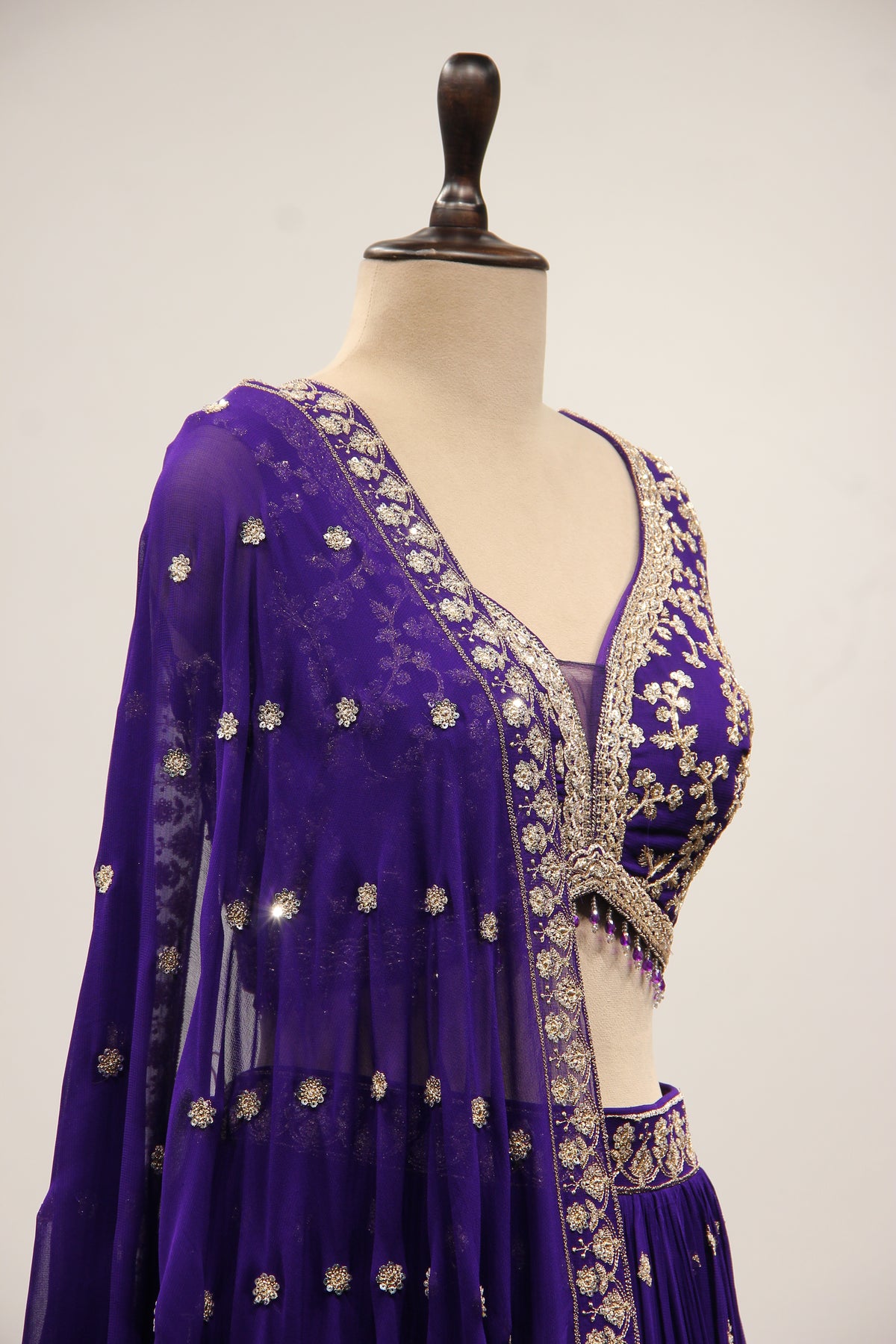 Georgette Lehenga with Zari & Sequin Handwork Plunge V-Neck Crop Top in Purple – other side close-up