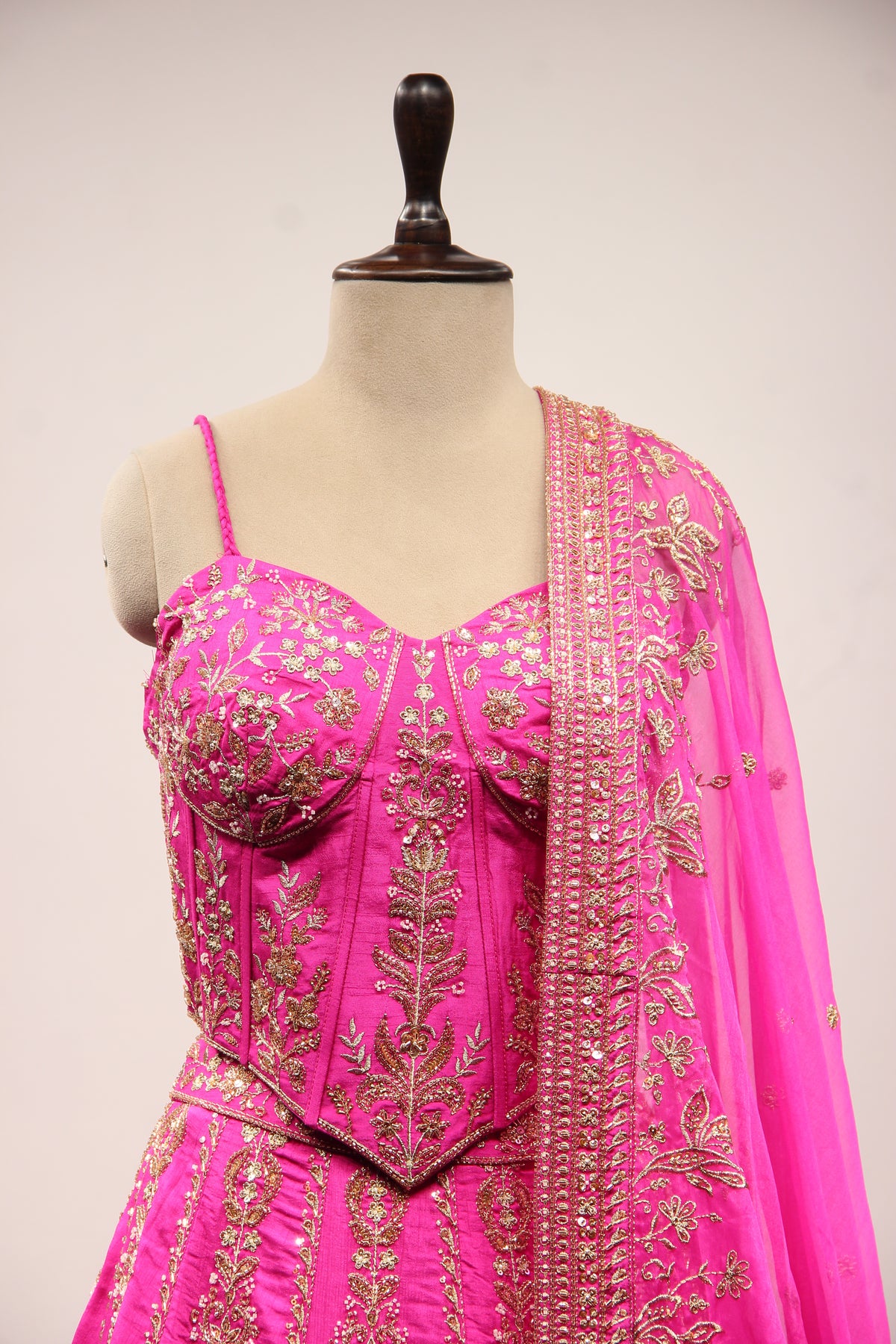 Royal Blue Dupion Lehenga with Corset Blouse, Zari & Cut Dana Handwork in Pink – front close-up