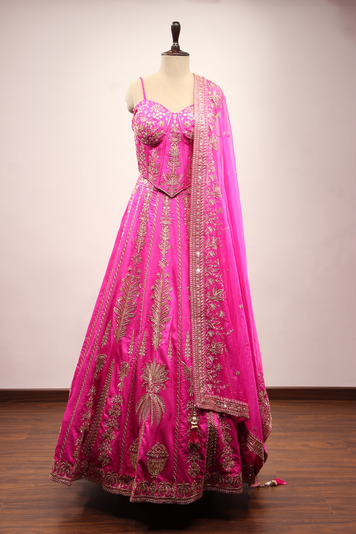 Royal Blue Dupion Lehenga with Corset Blouse, Zari & Cut Dana Handwork in Pink – front view