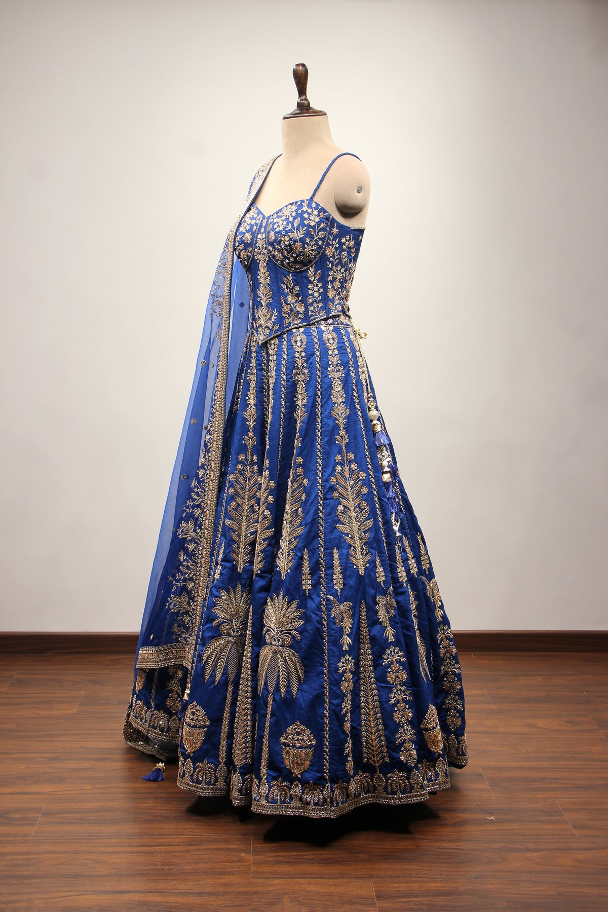Royal Blue Dupion Lehenga with Corset Blouse, Zari & Cut Dana Handwork in Blue – side view