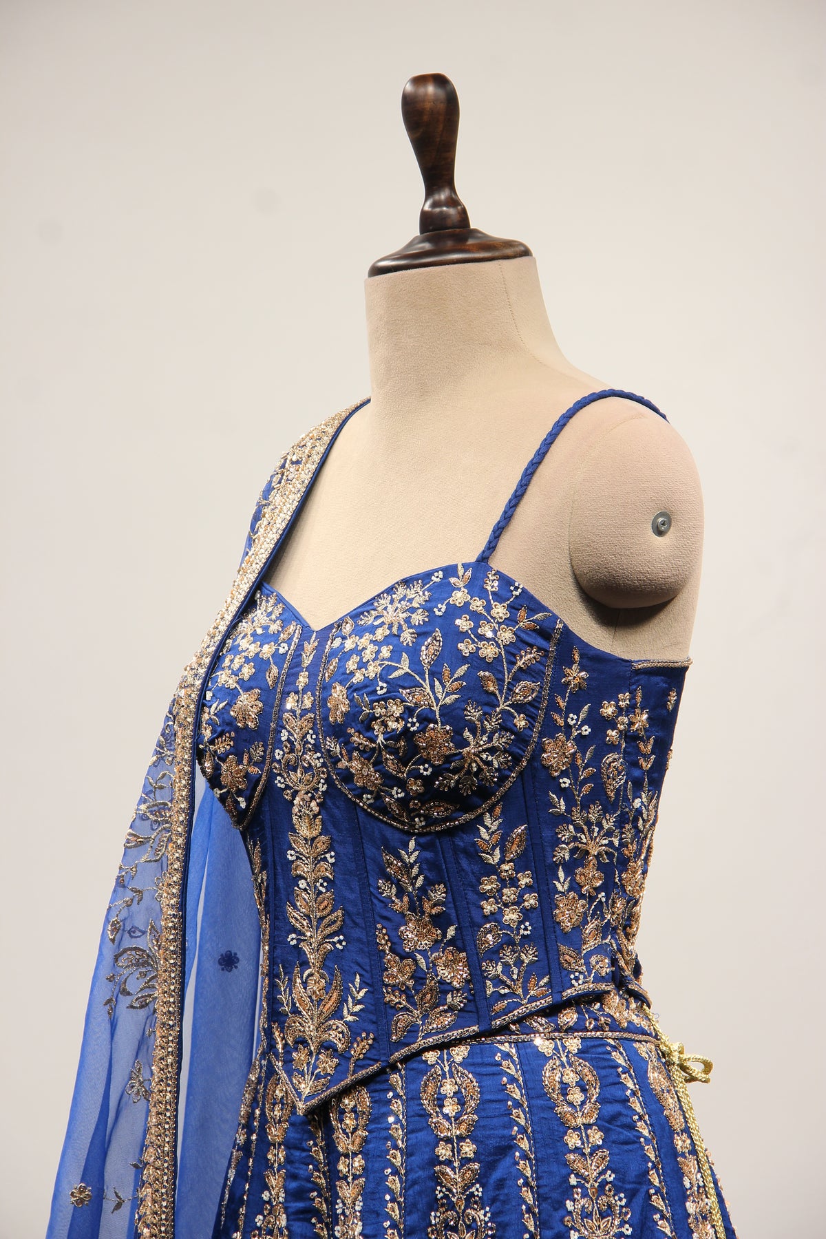 Royal Blue Dupion Lehenga with Corset Blouse, Zari & Cut Dana Handwork in Blue – side close-up