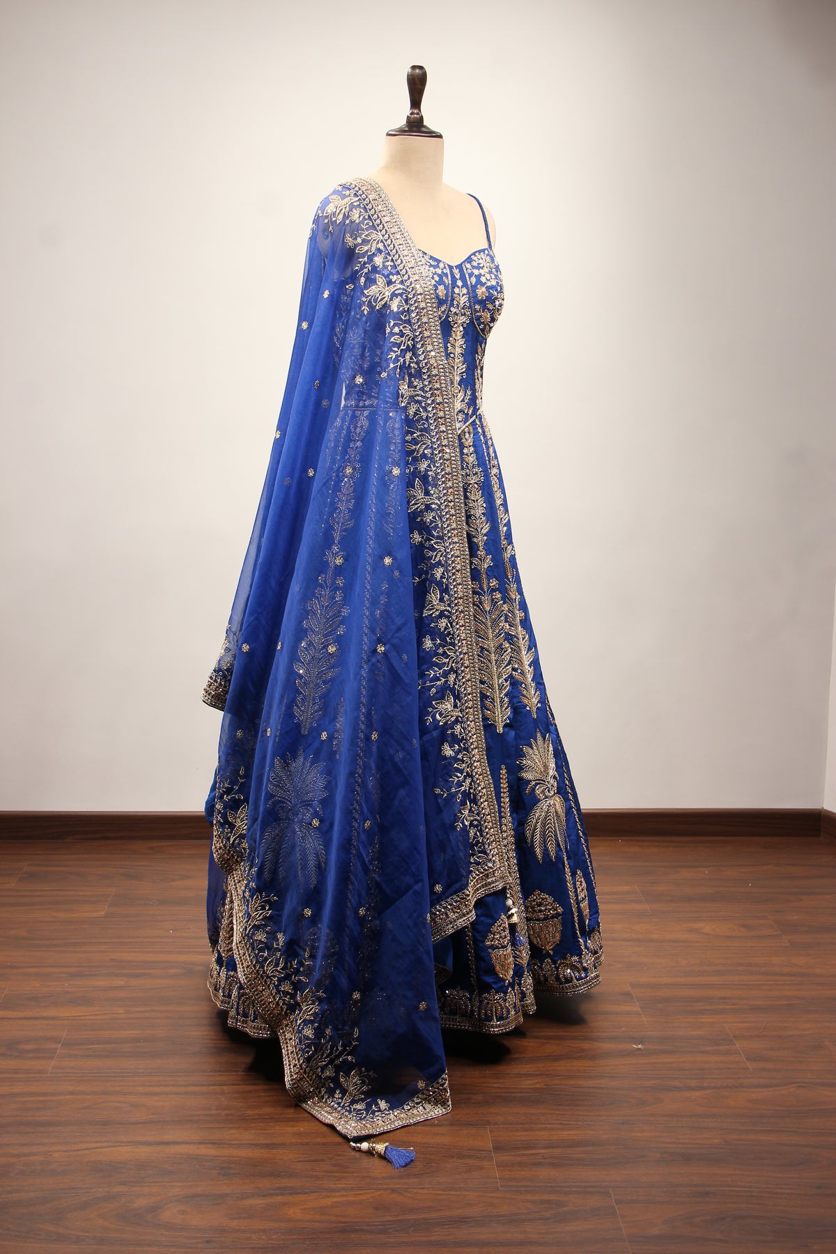 Royal Blue Dupion Lehenga with Corset Blouse, Zari & Cut Dana Handwork in Blue – other side view