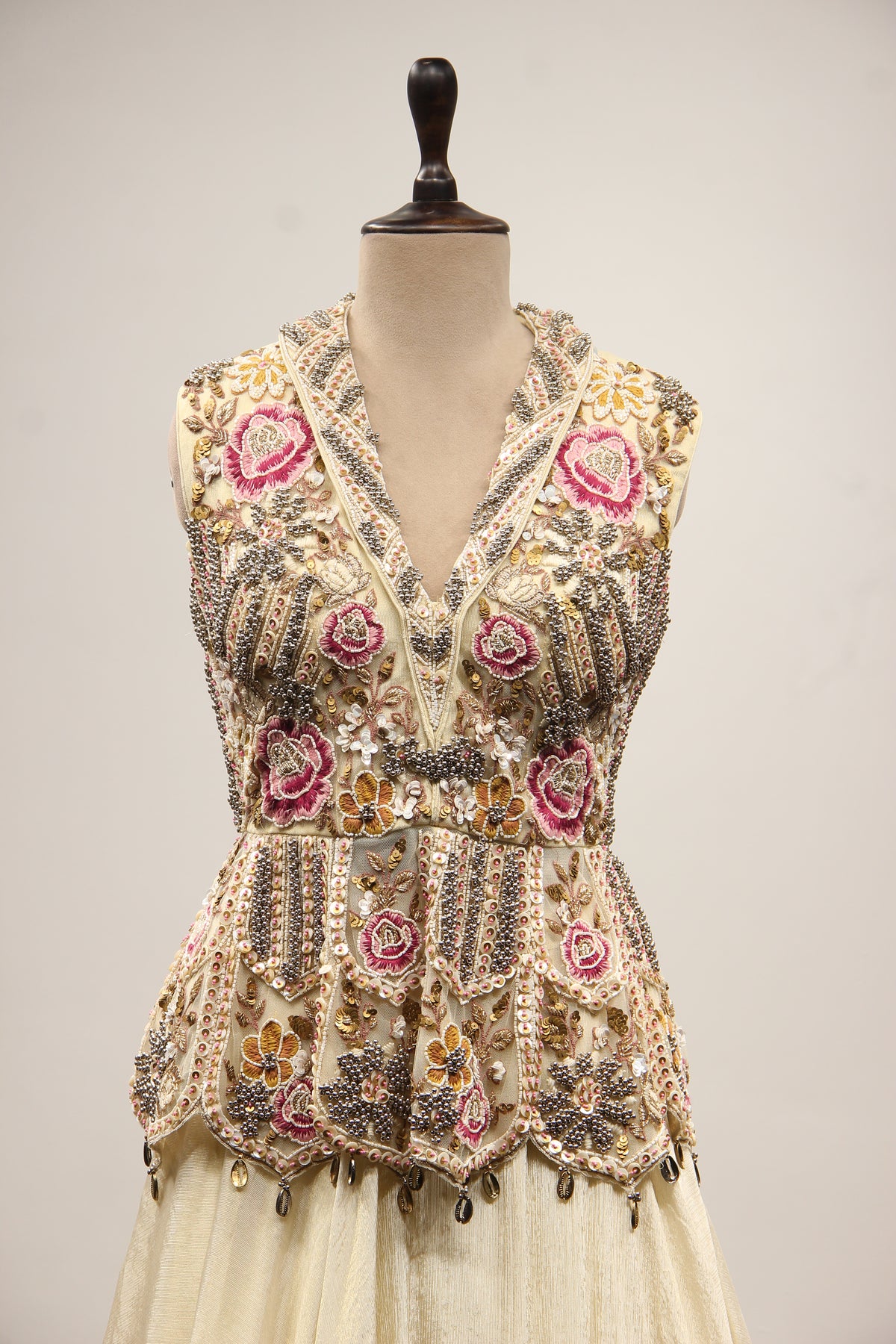 Off White Tissue Lehenga with Resham & Bead Handwork Floral Peplum Top – front close-up