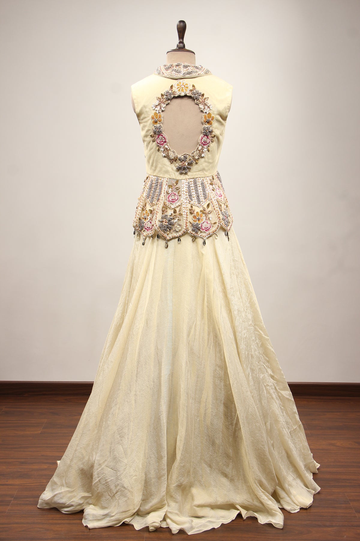Off White Tissue Lehenga with Resham & Bead Handwork Floral Peplum Top – back view