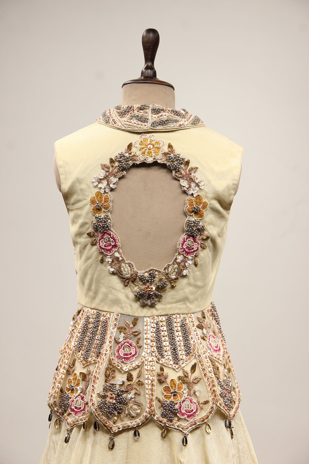 Off White Tissue Lehenga with Resham & Bead Handwork Floral Peplum Top – back close-up