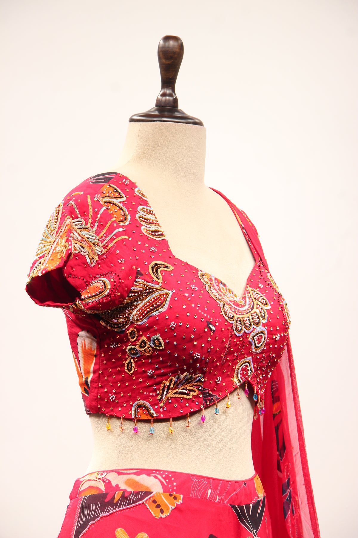 Red Organza Lehenga with Printed & Cut Dana Handwork Cap Sleeve Top – other side close-up