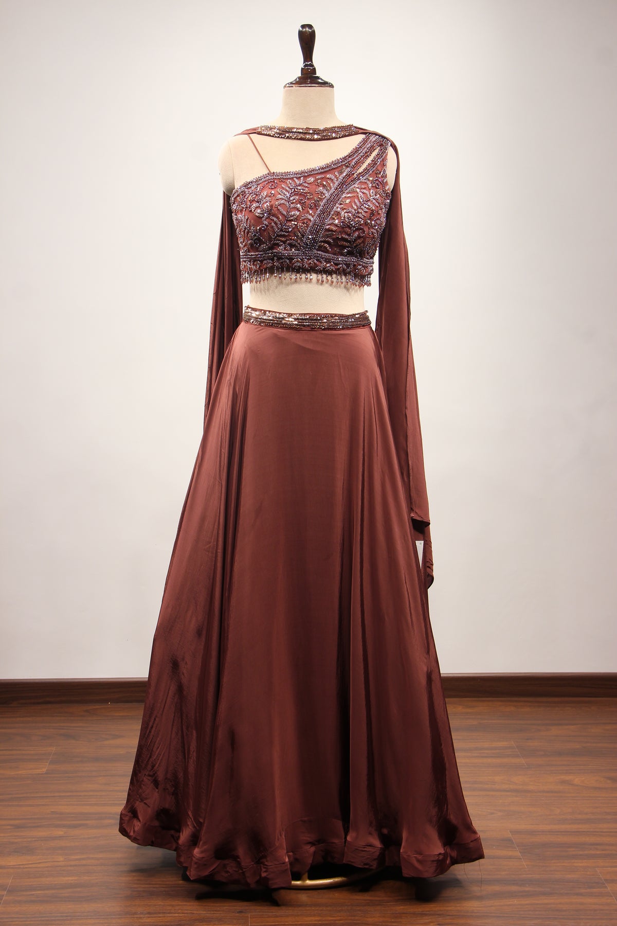 Brown Crepe Off Shoulder Lehenga with Cut Dana & Bead Handwork Top – front view