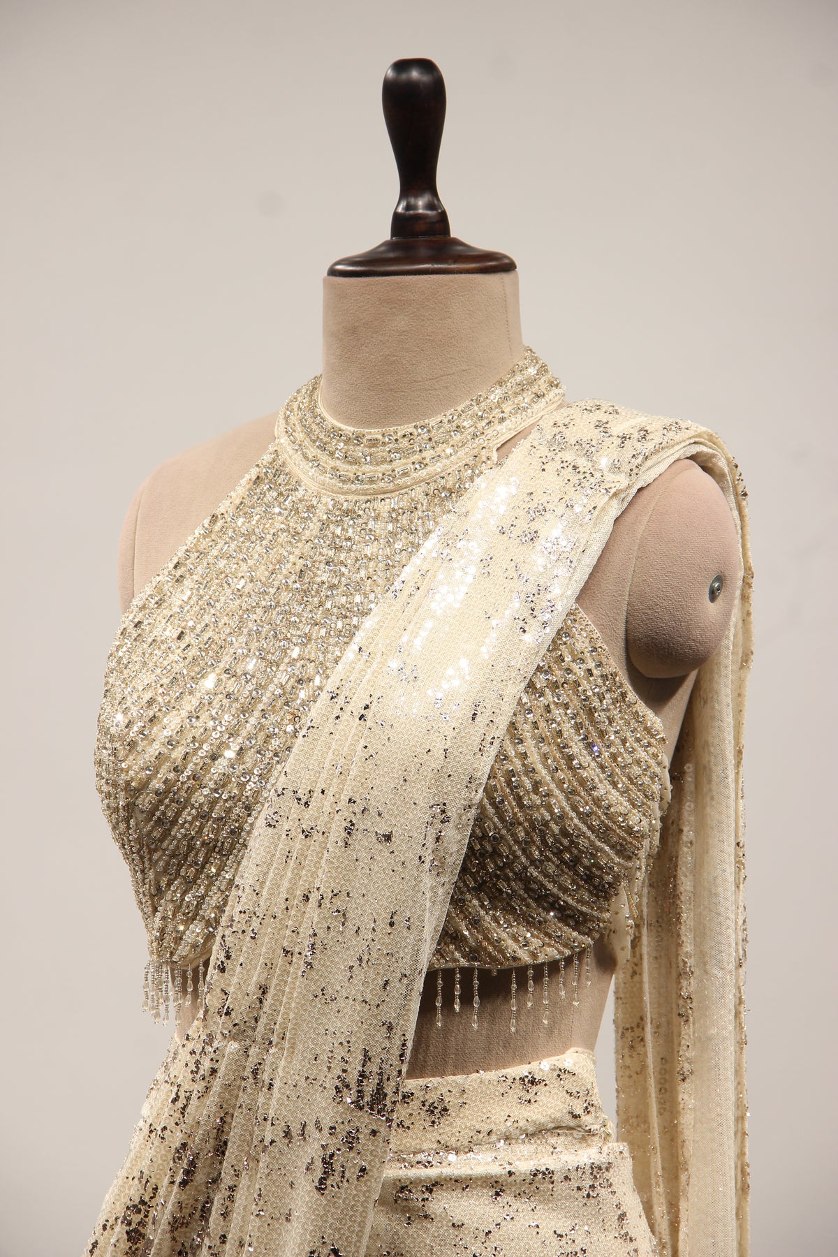 Imported Halter Neck Drape Saree with Mirror & Sequin Handwork in Cream – side close-up