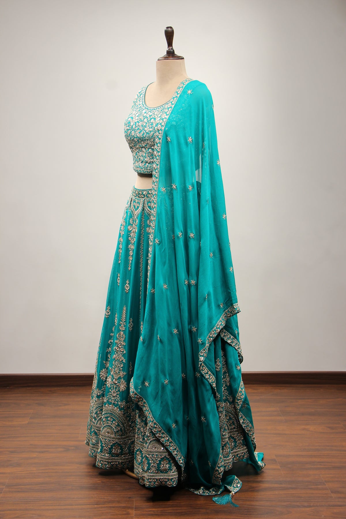 Rama Green Georgette Lehenga with Zari & Sequin Handwork Crop Top – side view