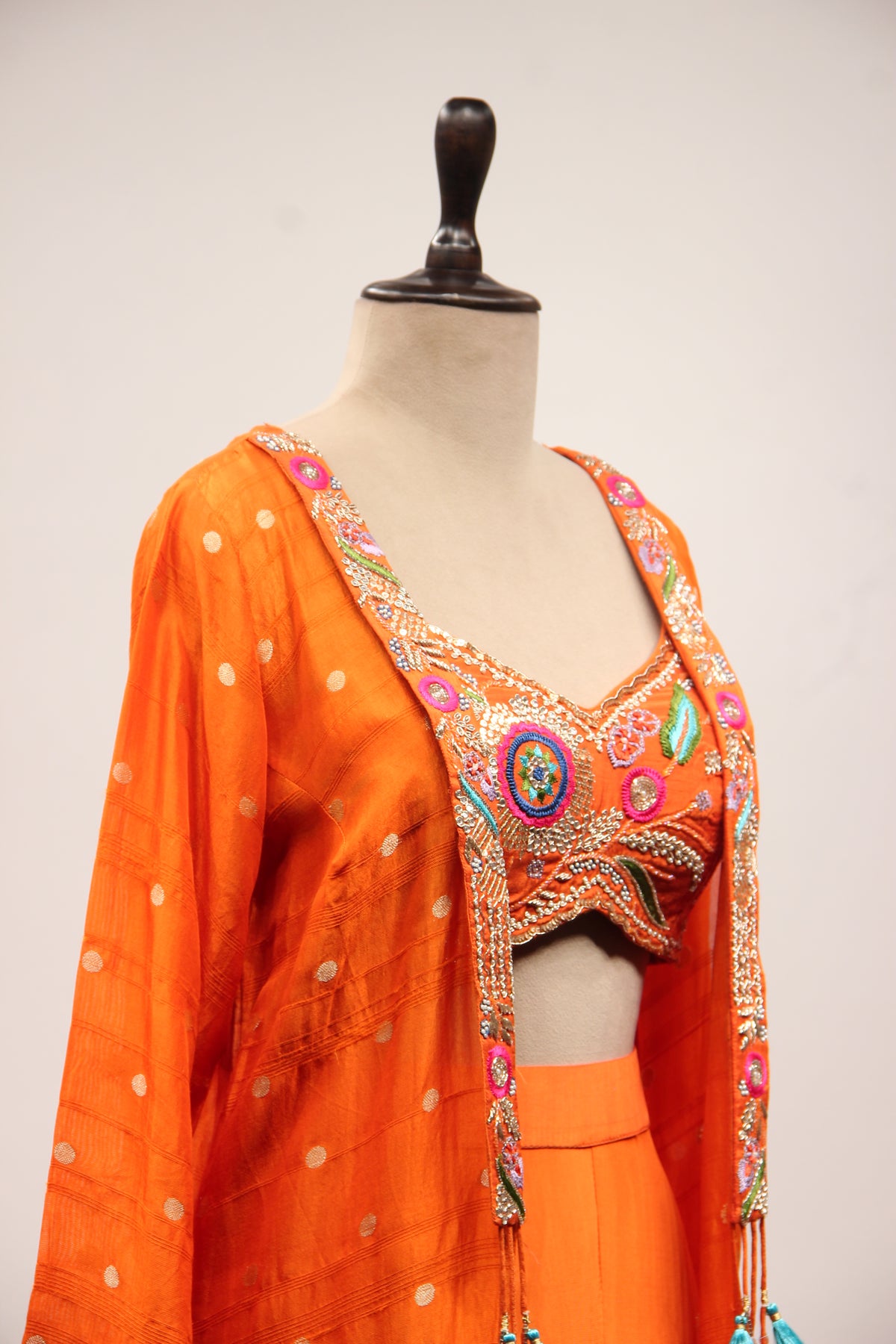 Crepe Indo Western Shrug Set with Cut Dana & Thread Handwork Crop Top in Orange – other side close-up, with shrug