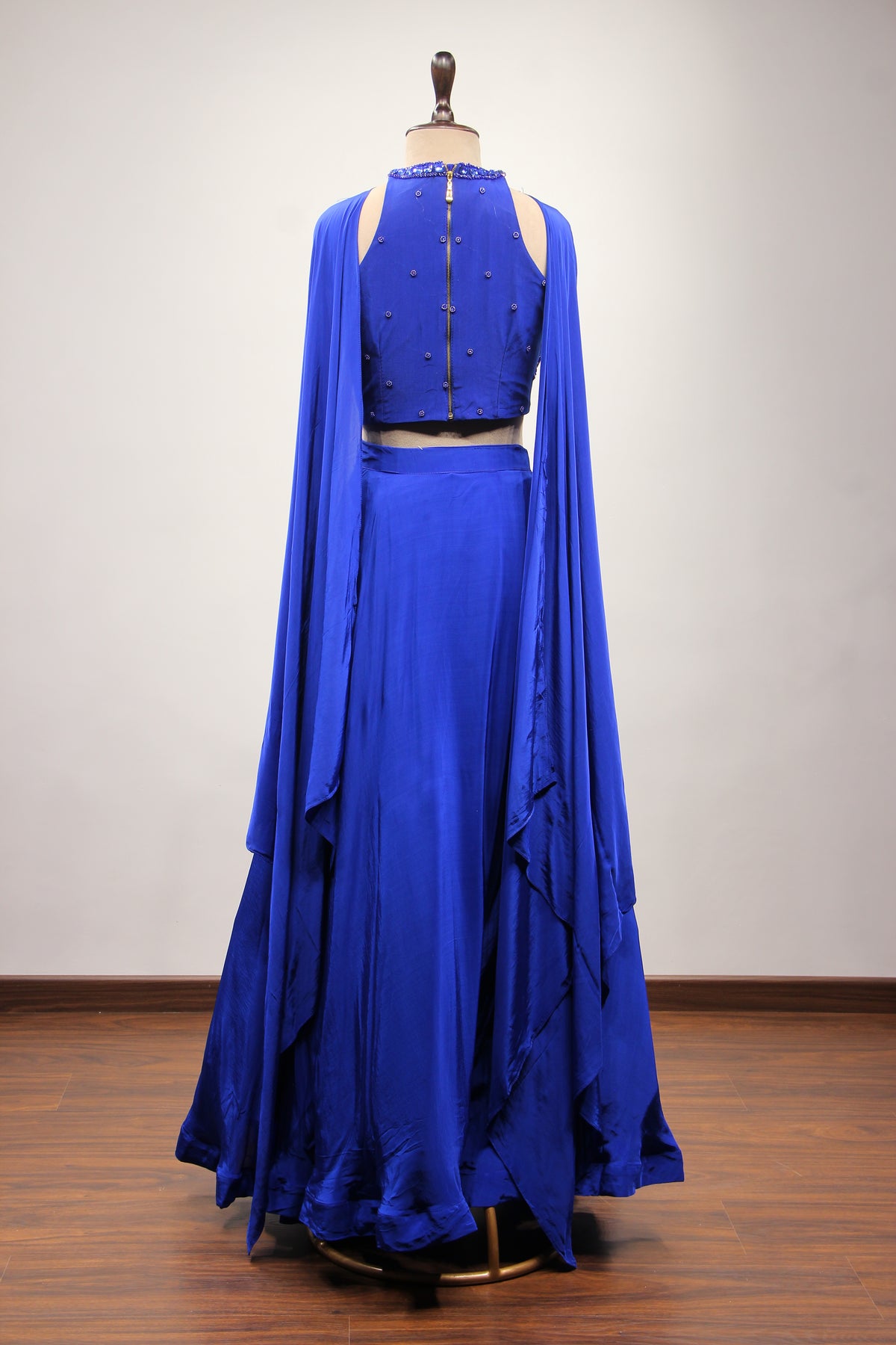 Electric Blue Crepe Halter Lehenga with Stone & Cut Dana Handwork – back view