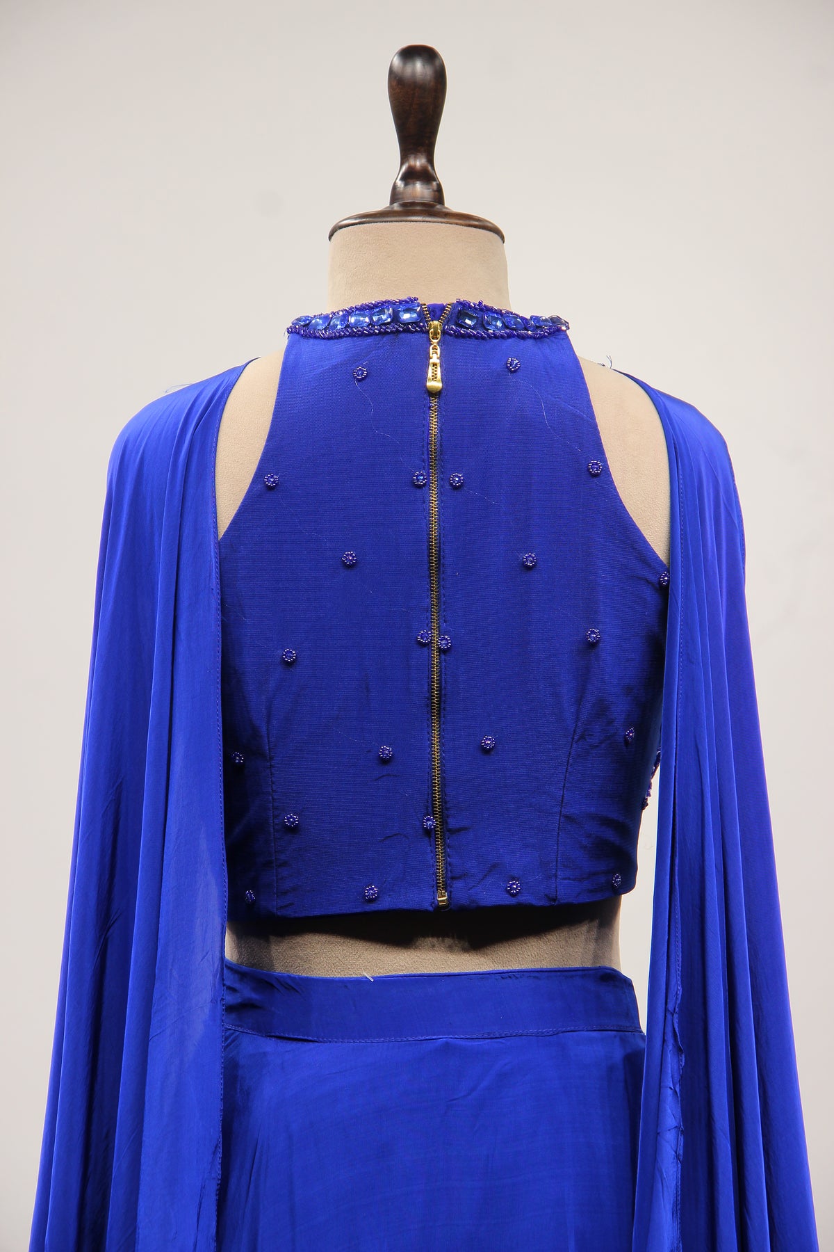 Electric Blue Crepe Halter Lehenga with Stone & Cut Dana Handwork – back close-up