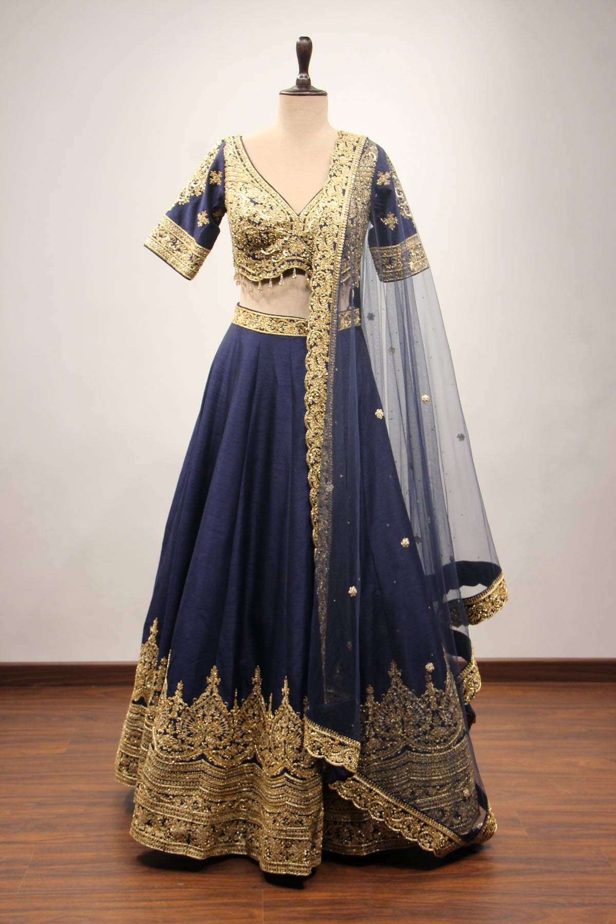 Dupion Lehenga with Zari & Sequin Handwork Half Sleeve V-Neck Crop Top in Blue – front view