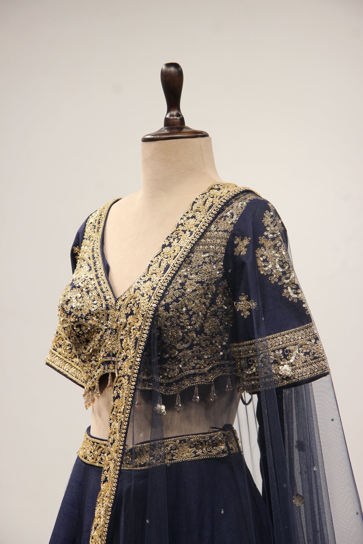 Dupion Lehenga with Zari & Sequin Handwork Half Sleeve V-Neck Crop Top in Blue – side close-up