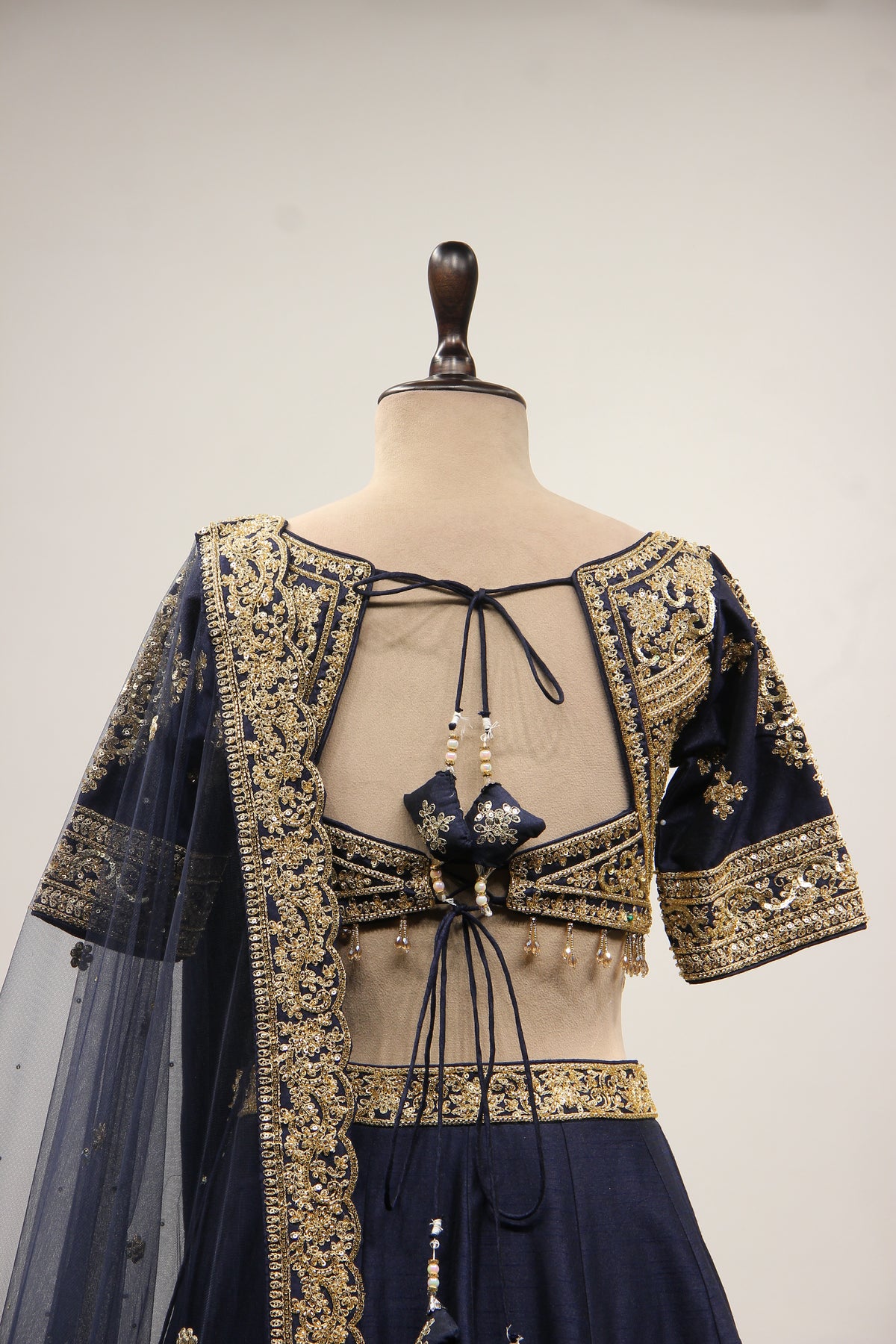 Dupion Lehenga with Zari & Sequin Handwork Half Sleeve V-Neck Crop Top in Blue – back close-up