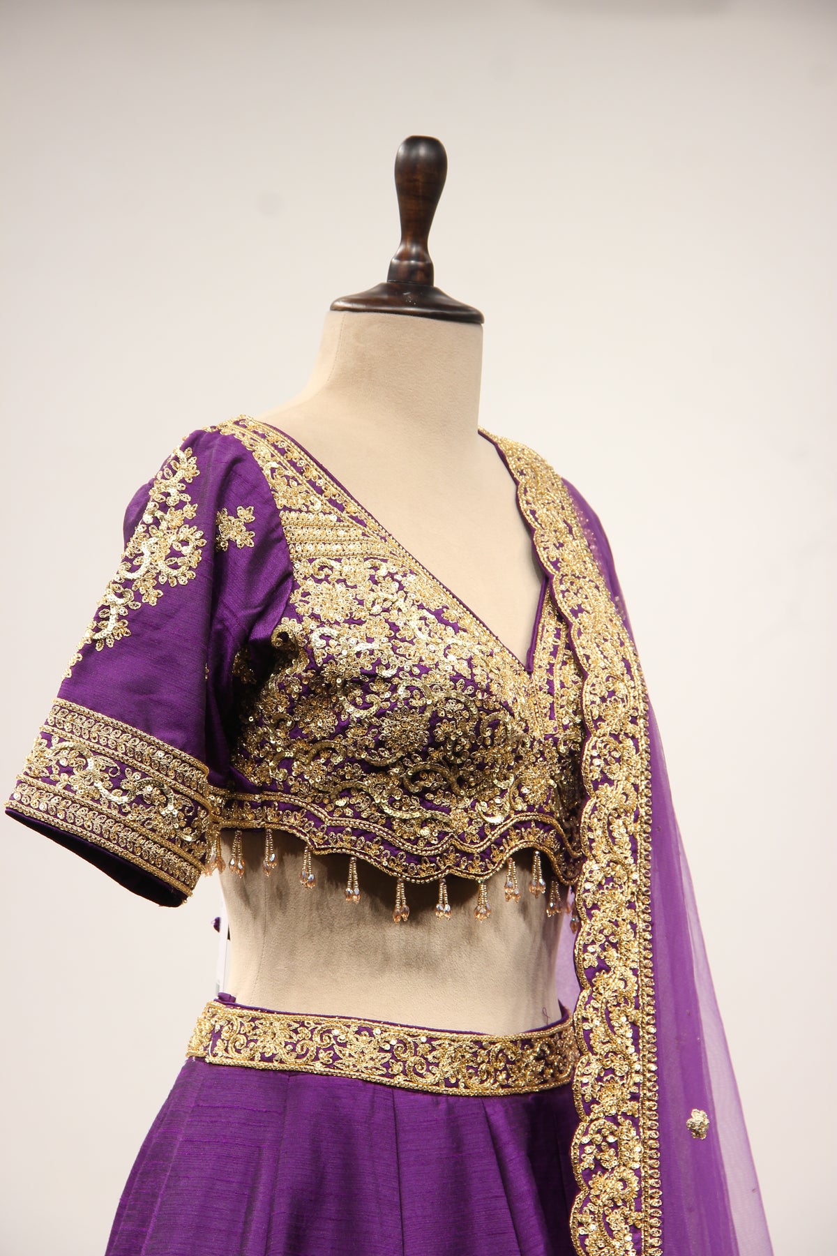Dupion Lehenga with Zari & Sequin Handwork Half Sleeve V-Neck Crop Top in Purple – other side close-up