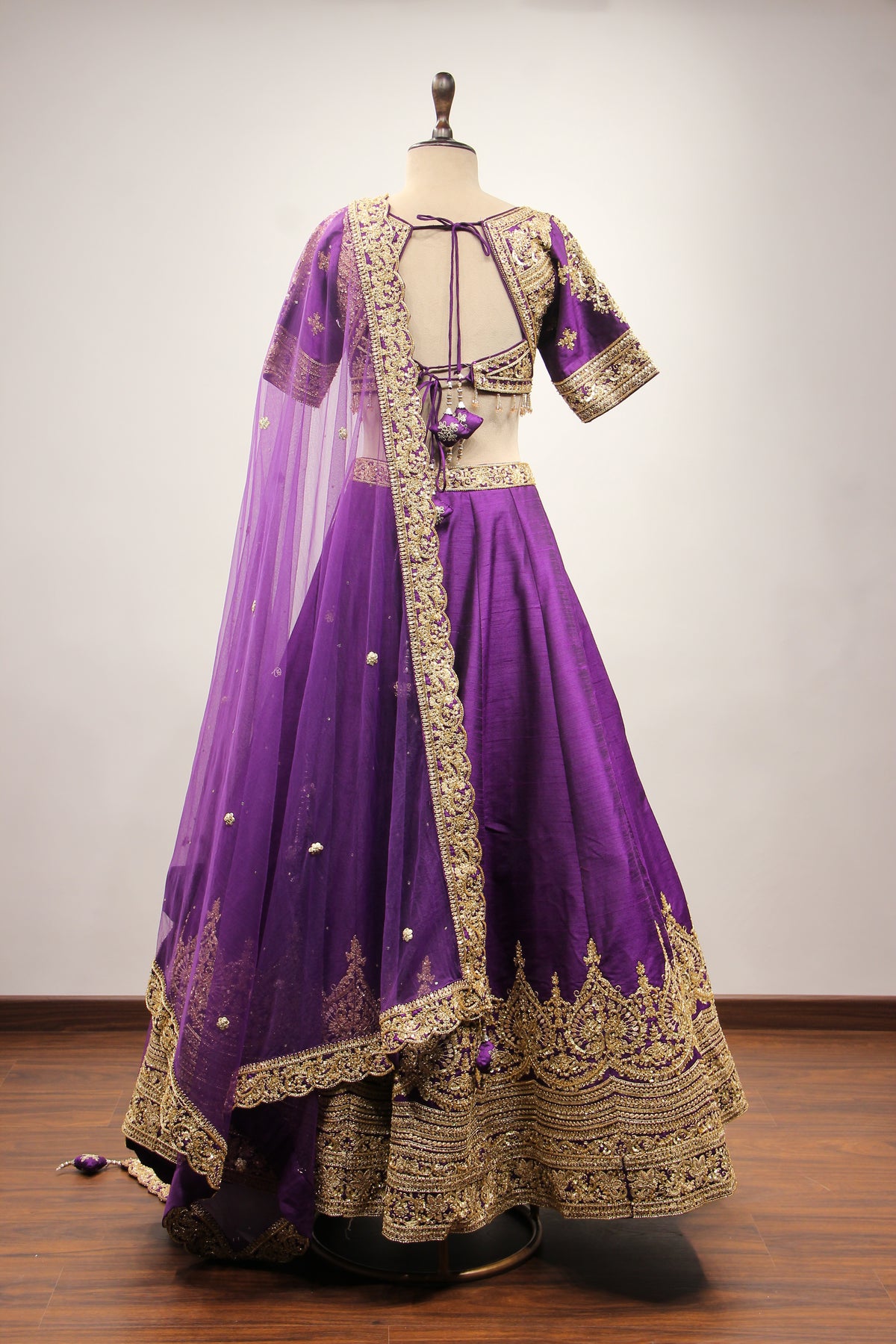 Dupion Lehenga with Zari & Sequin Handwork Half Sleeve V-Neck Crop Top in Purple – back view