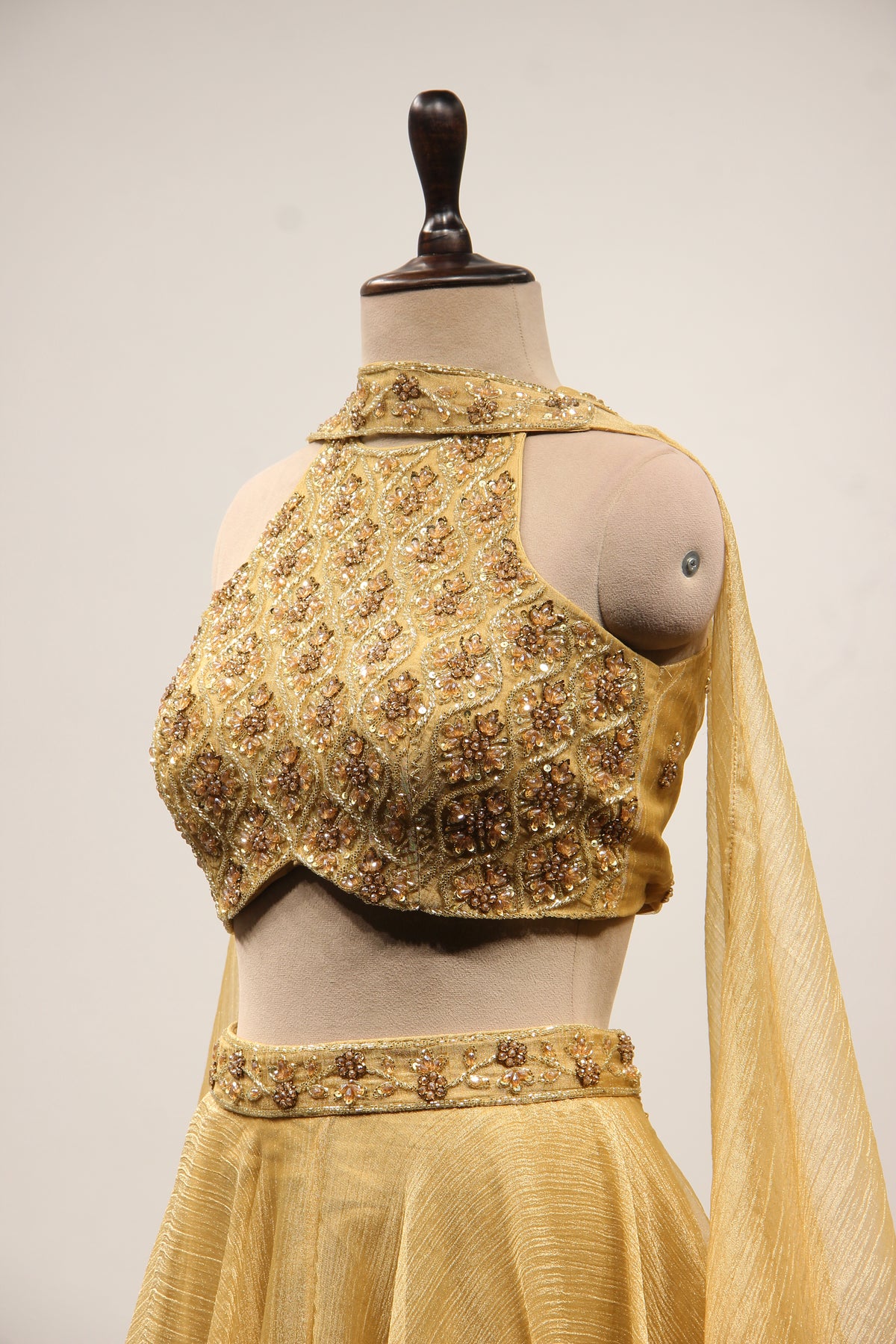Gold Shimmer Tissue Halter Neck Lehenga with Cut Dana & Bead Handwork – side close-up