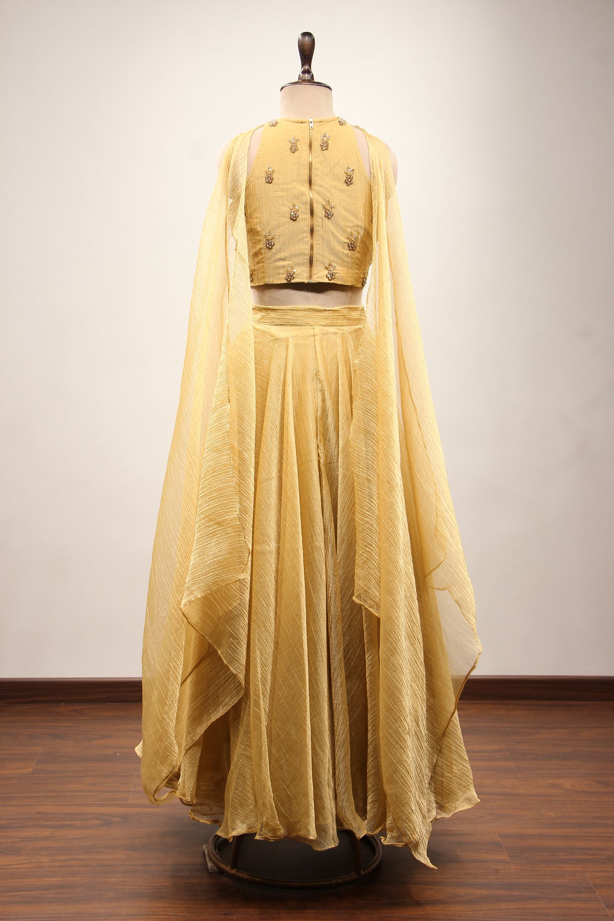 Gold Shimmer Tissue Halter Neck Lehenga with Cut Dana & Bead Handwork – back view