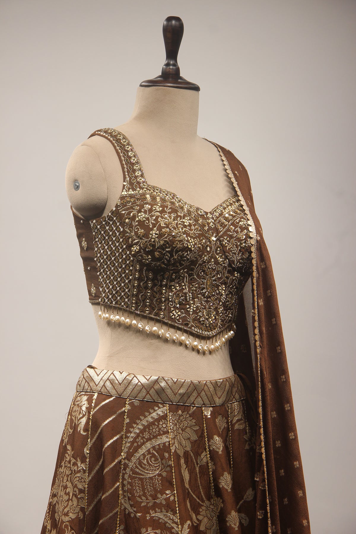 Brown Banarasi Brocade Corset Lehenga with Hand Embroidery & Mirror Handwork