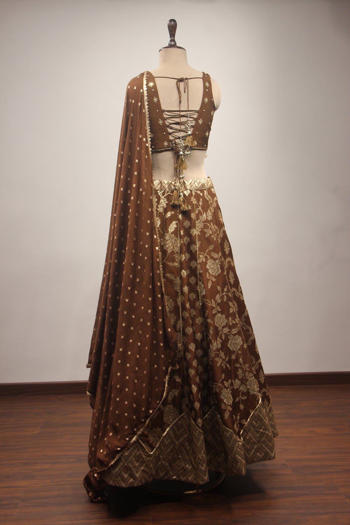 Brown Banarasi Brocade Corset Lehenga with Hand Embroidery & Mirror Handwork