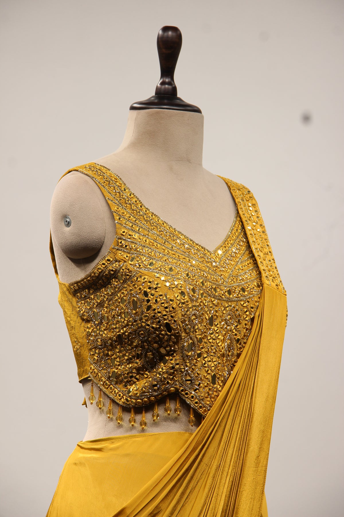 Crepe Drape Saree with Mirror & Resham Handwork Crop Top in Mustard