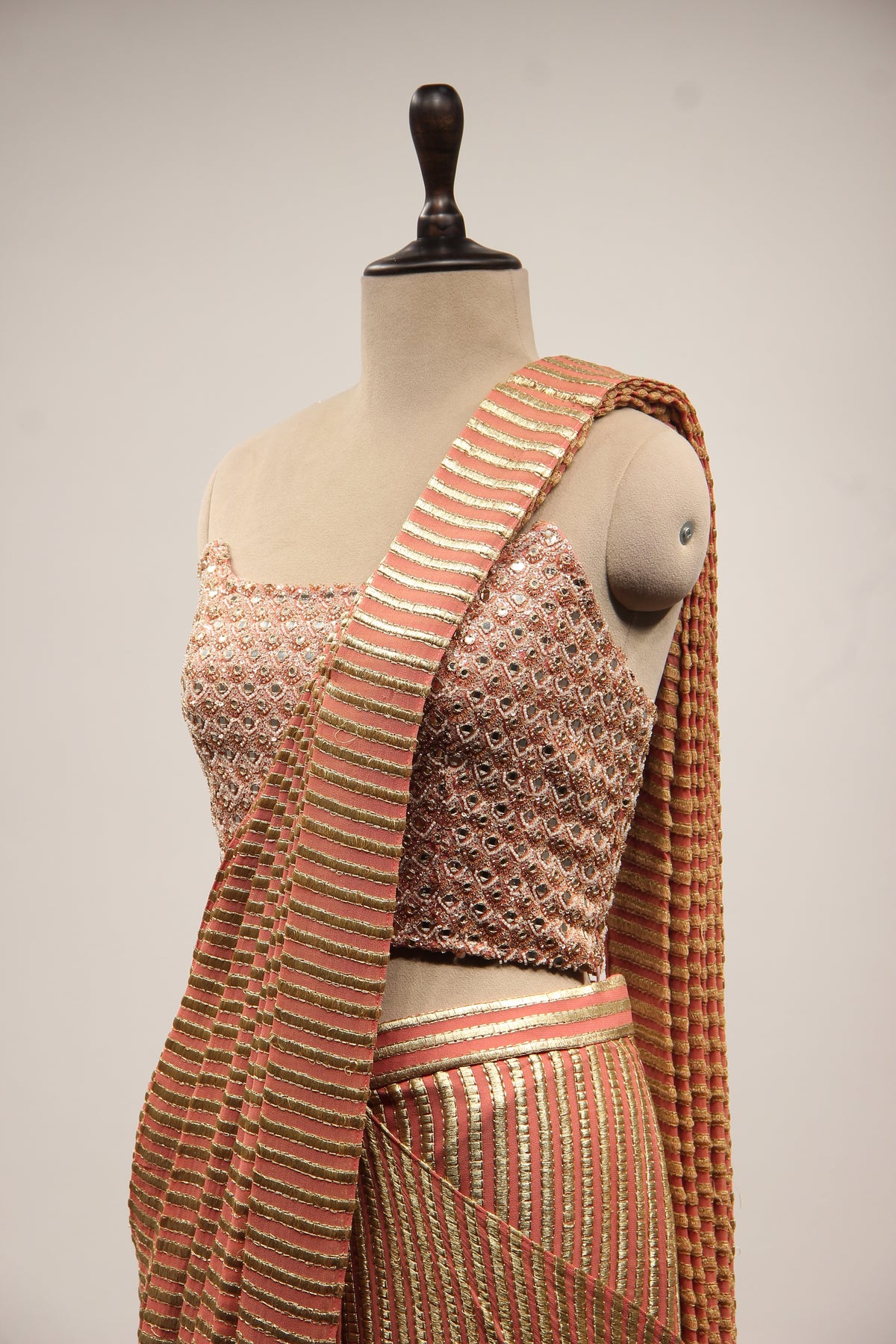 Georgette Drape Saree with Mirror & Pearl Handwork Corset Blouse in Peach