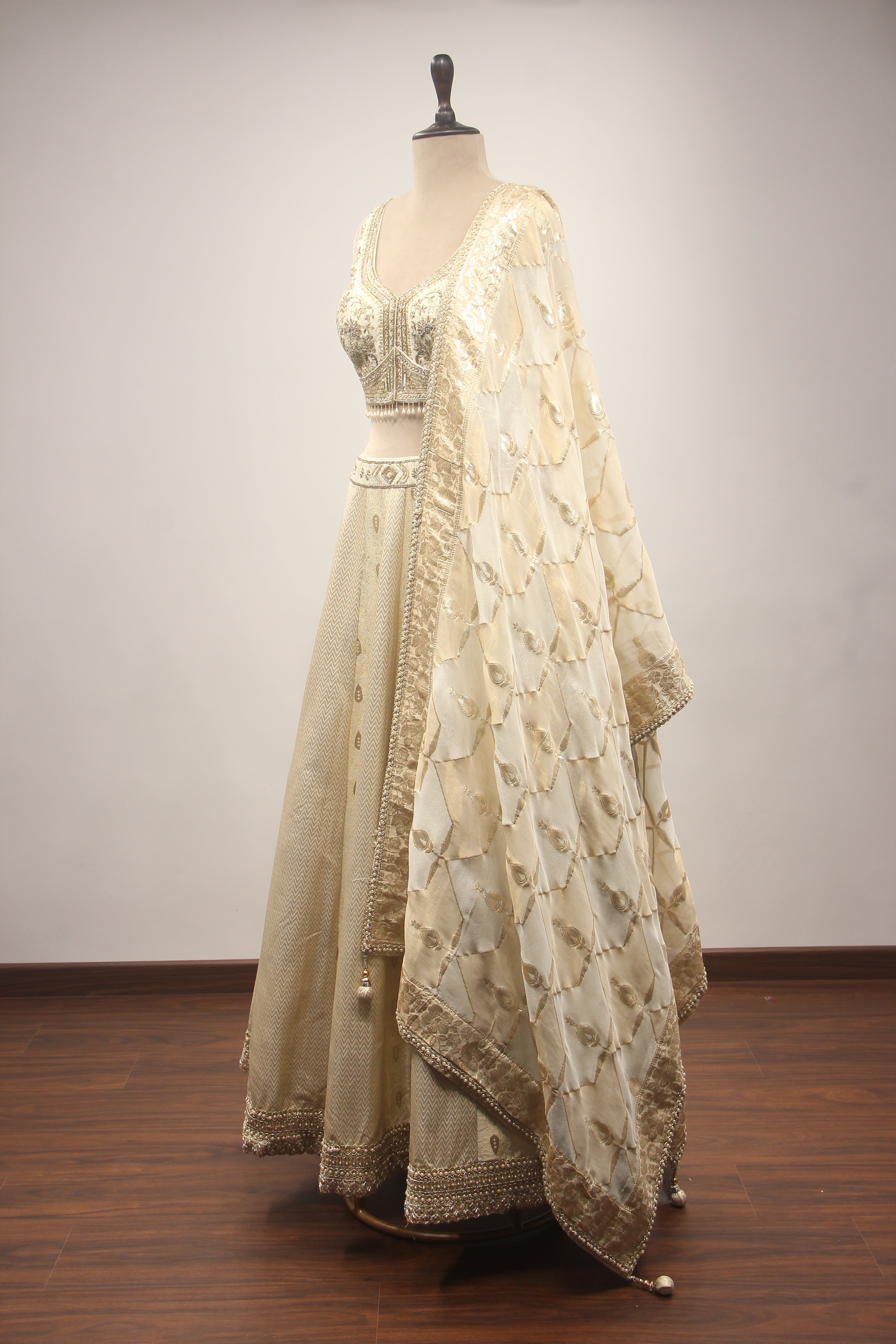 Cream Banarasi Brocade Lehenga with Hand Embroidery & Zardozi Handwork