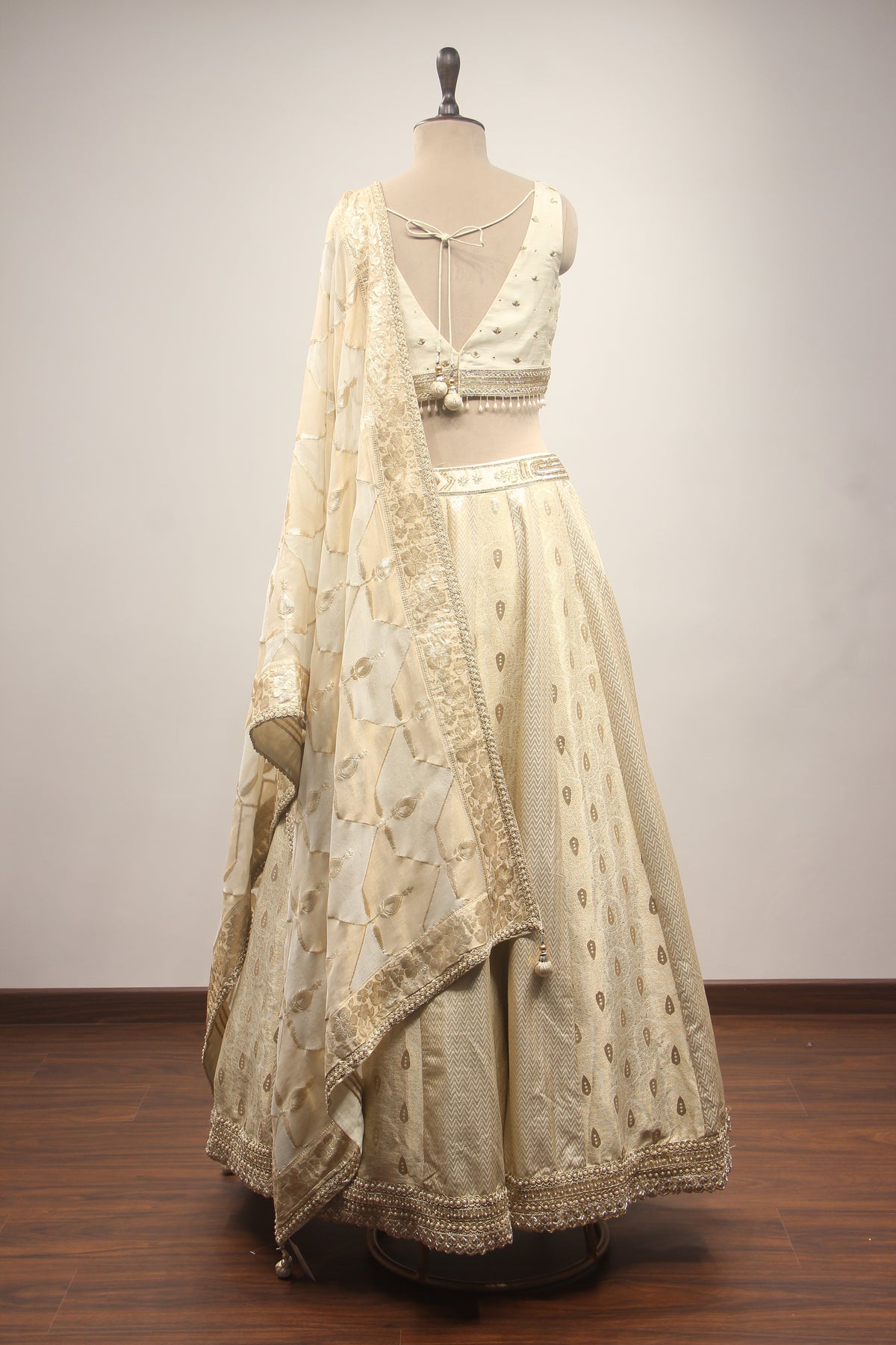Cream Banarasi Brocade Lehenga with Hand Embroidery & Zardozi Handwork