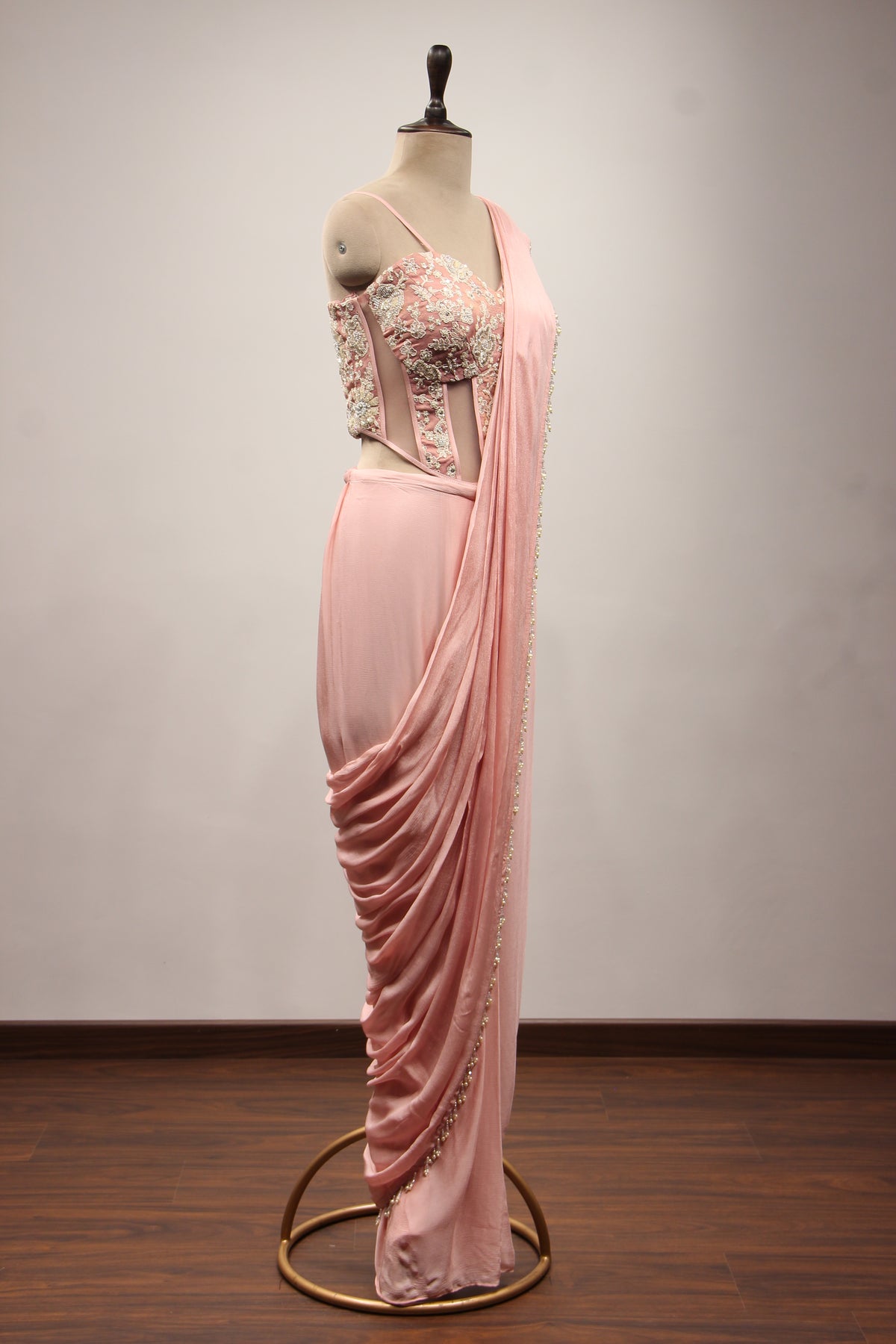 Baby Pink Crepe Drape Saree with Hand Embroidery & Resham Net Corset – side view