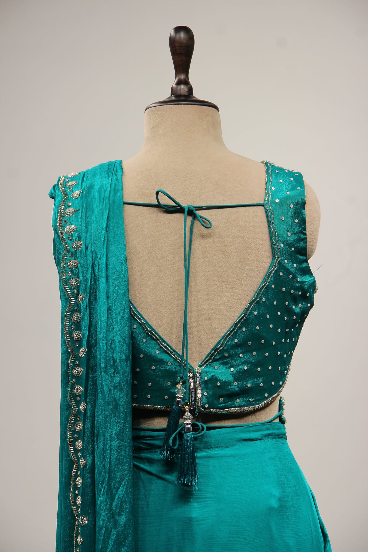 Rama Green Crepe Drape Saree with Cut Dana & Sequin Handwork and Belt – back close-up