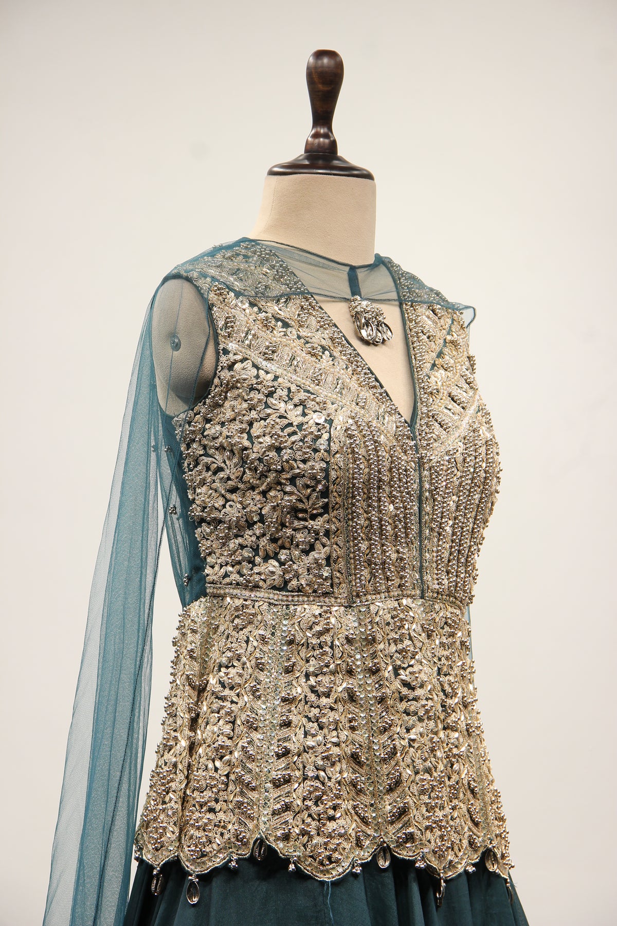 Bottle Green Organza Peplum Lehenga with Zari & Cut Dana Handwork – other side close-up