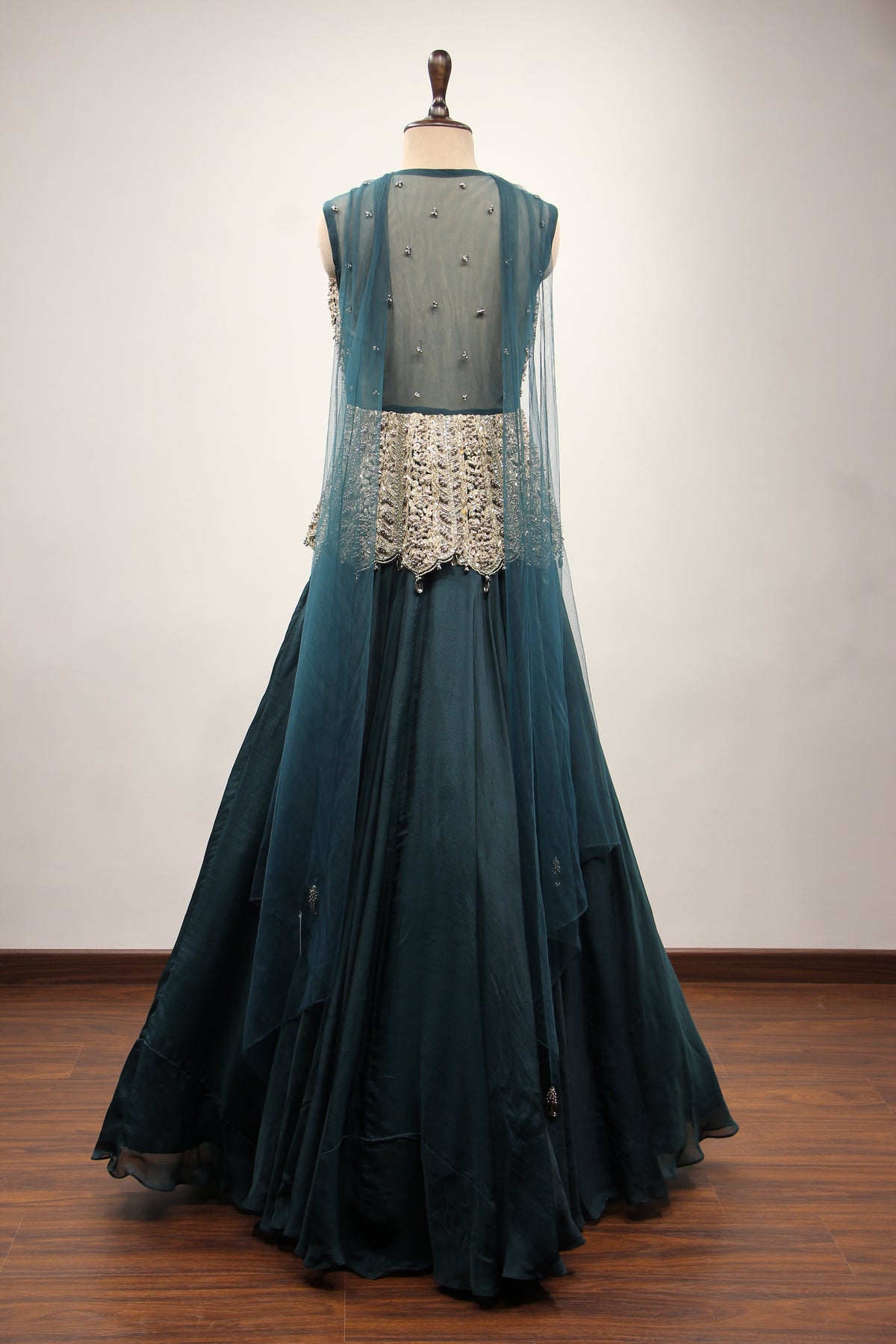 Bottle Green Organza Peplum Lehenga with Zari & Cut Dana Handwork – back view