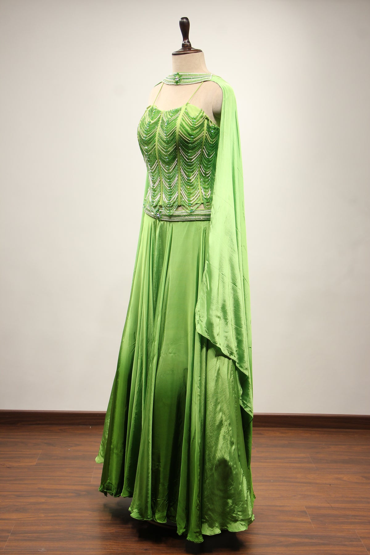 Green Crepe Lehenga with Hand Embroidery & Bead Handwork Net Corset – side view