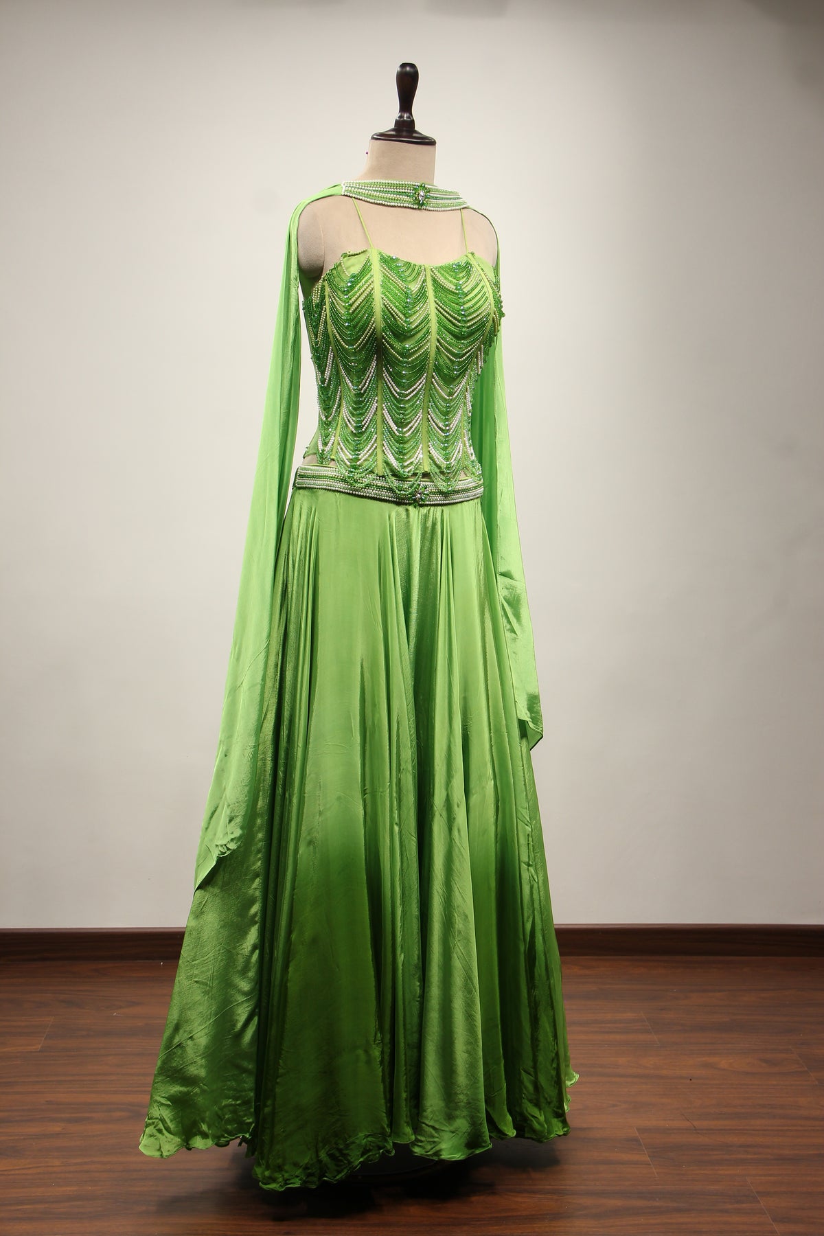 Green Crepe Lehenga with Hand Embroidery & Bead Handwork Net Corset – other side view