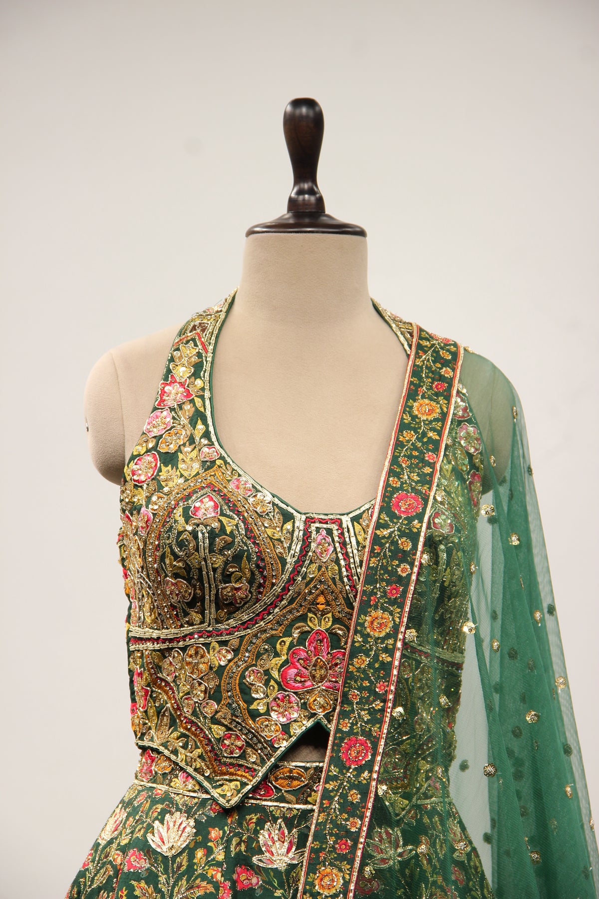 Bottle Green Dupion Halter Lehenga with Printed & Gota Patti Handwork – front close-up