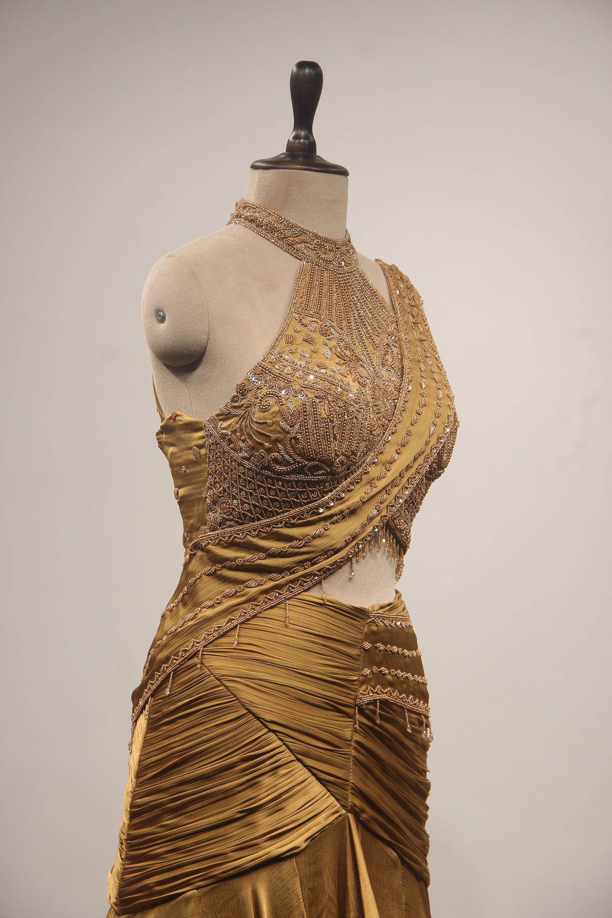 Gold Crepe Mermaid Lehenga with Bead & Cut Dana Handwork Drape Skirt