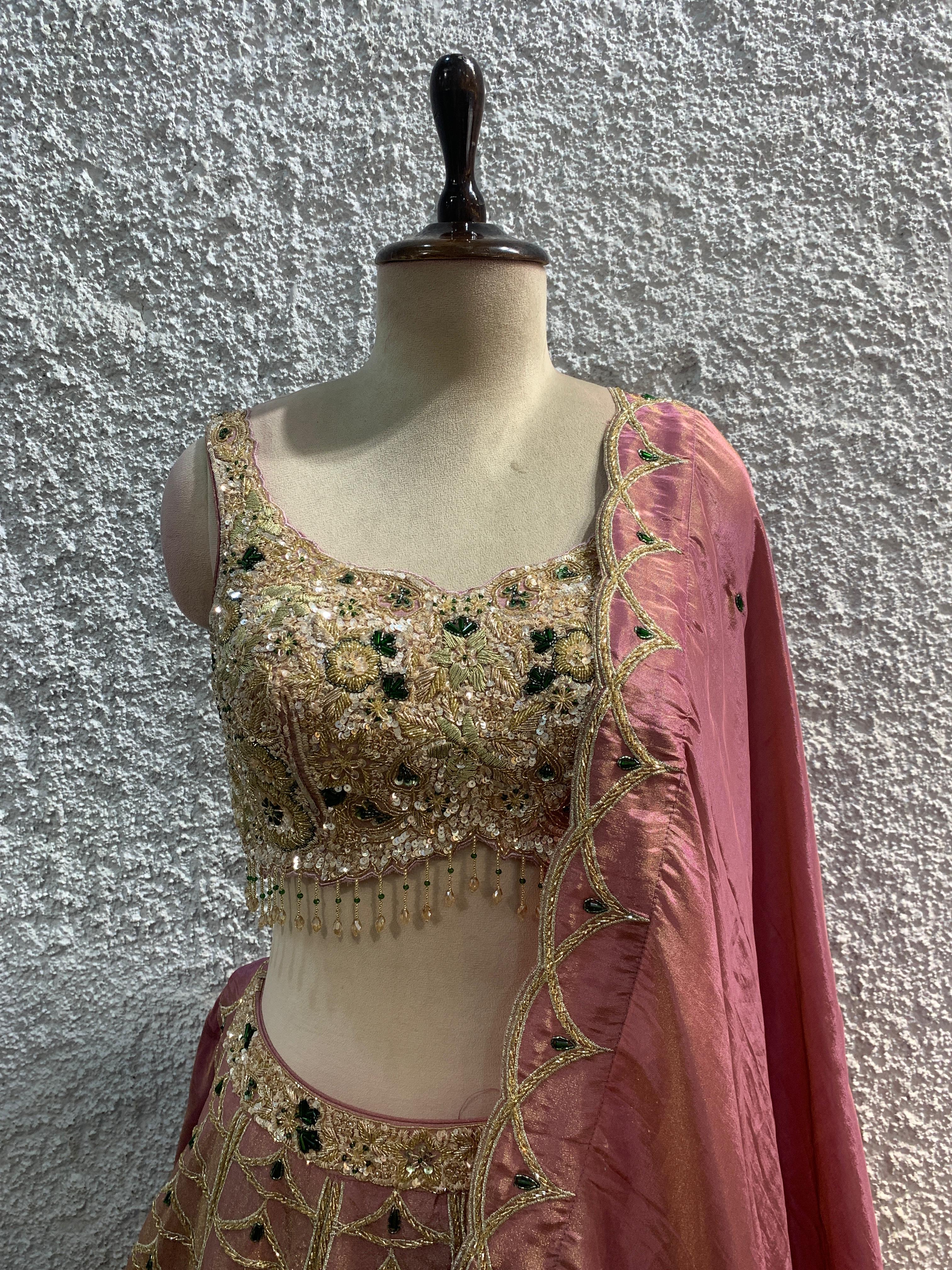 pink shimmer tissue Lehenga with green stone +embroidery lehenga with handwork blouse by OOS – women's ethnic wear – closeup view