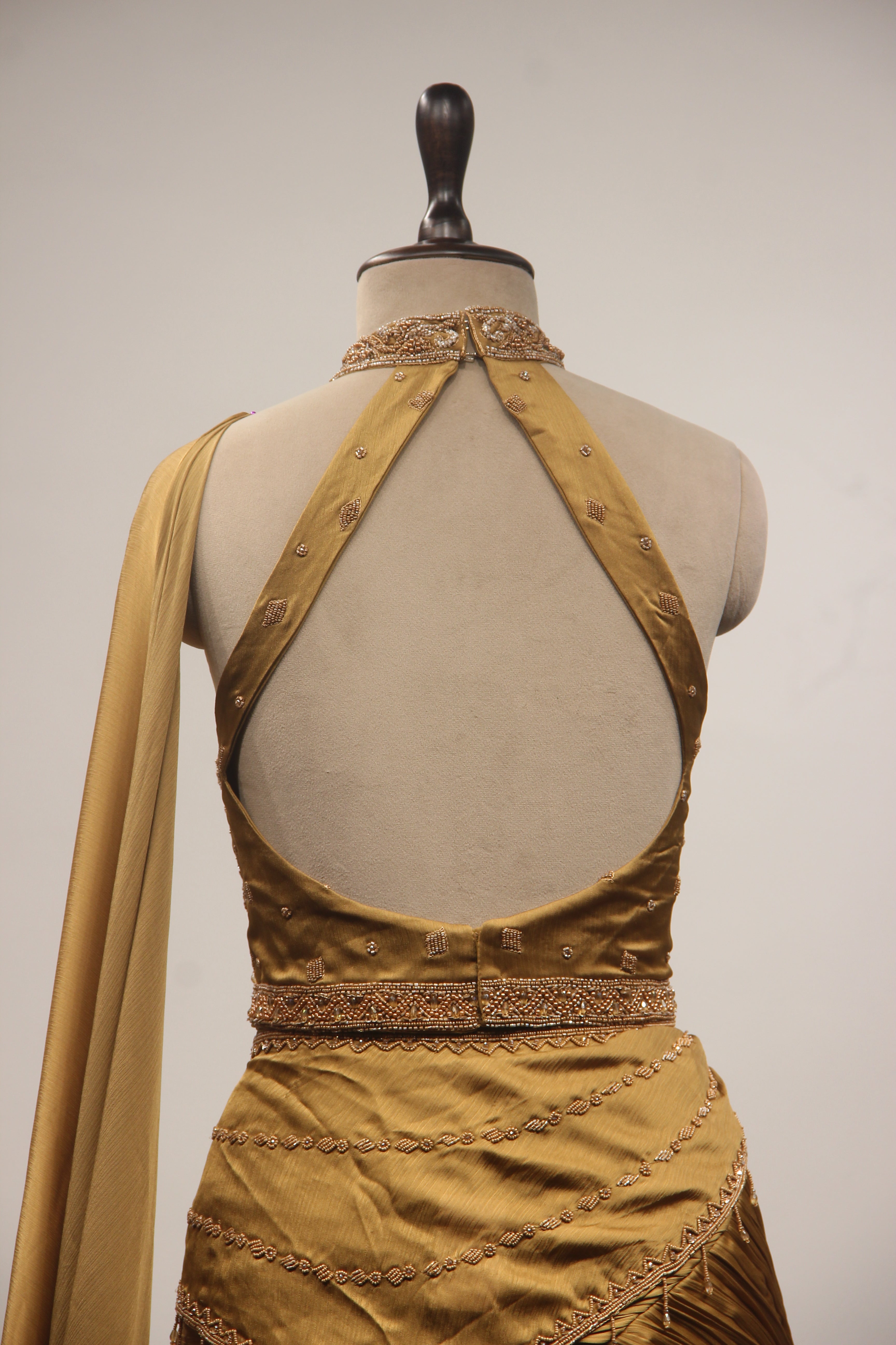 Gold Crepe Mermaid Lehenga with Bead & Cut Dana Handwork Drape Skirt