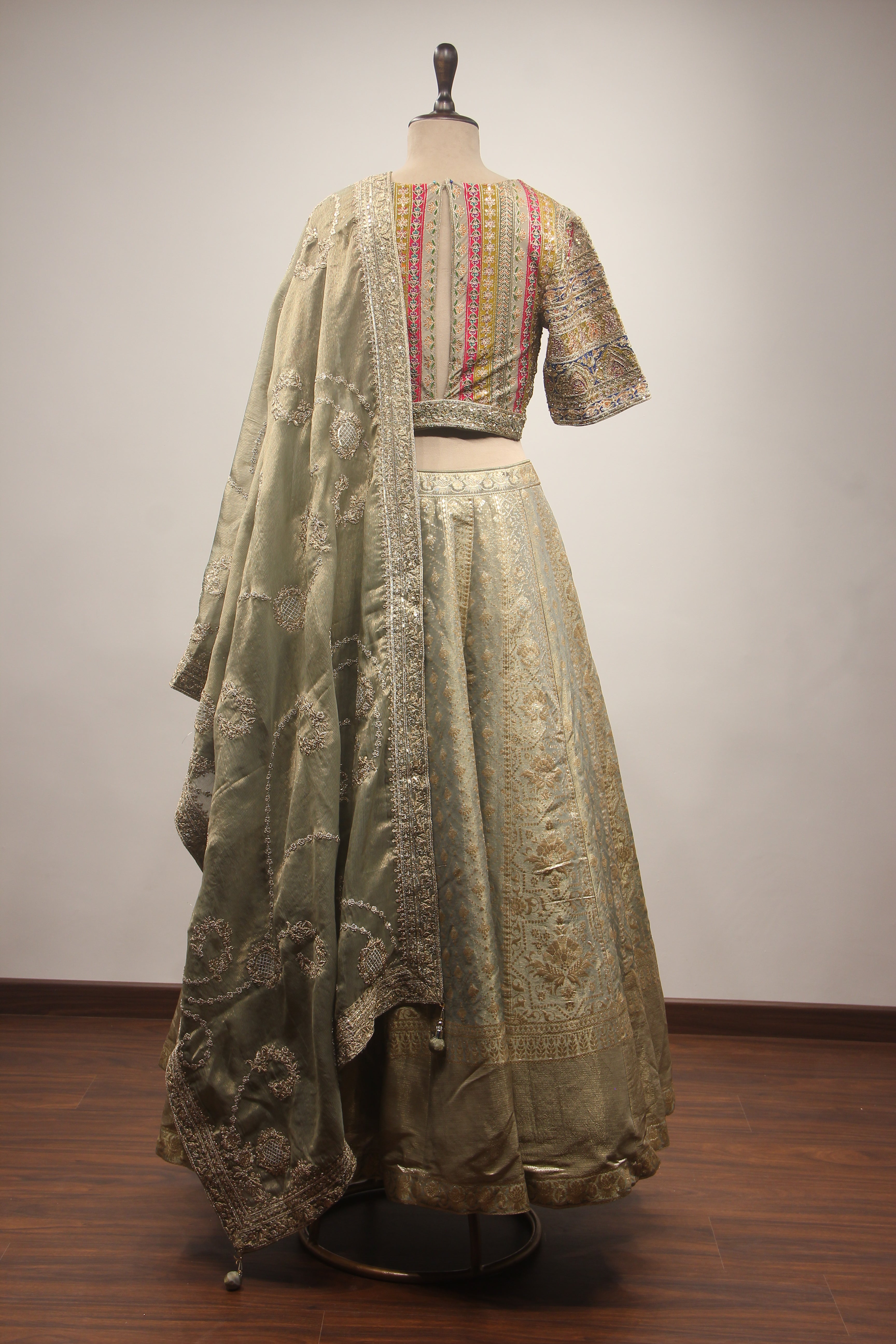 Olive Green Banarasi Brocade-Tissue Lehenga with Zardozi & Sequin Handwork Crop Top