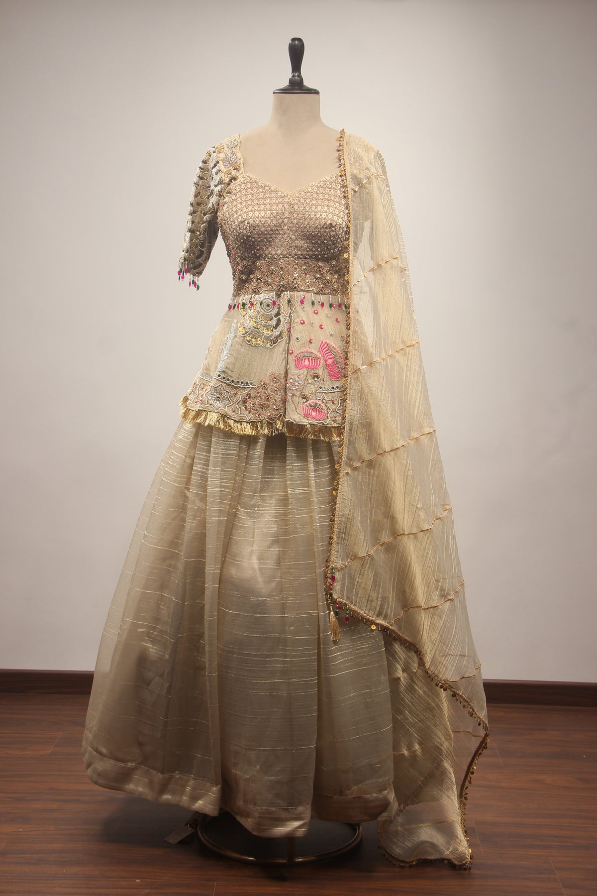 Gold Tissue Lehenga with Peplum Blouse & Cut Dana Bead Handwork
