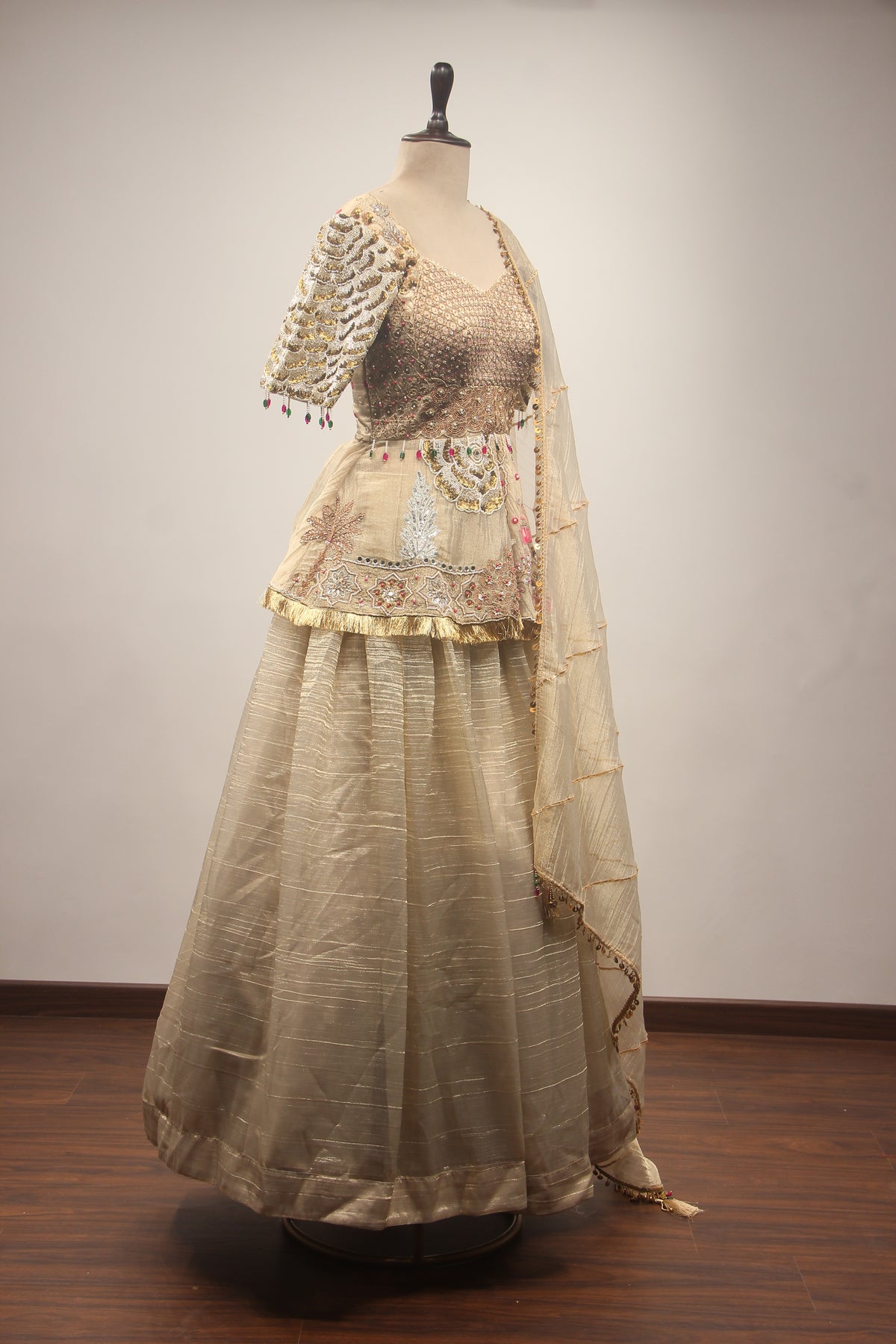 Gold Tissue Lehenga with Peplum Blouse & Cut Dana Bead Handwork