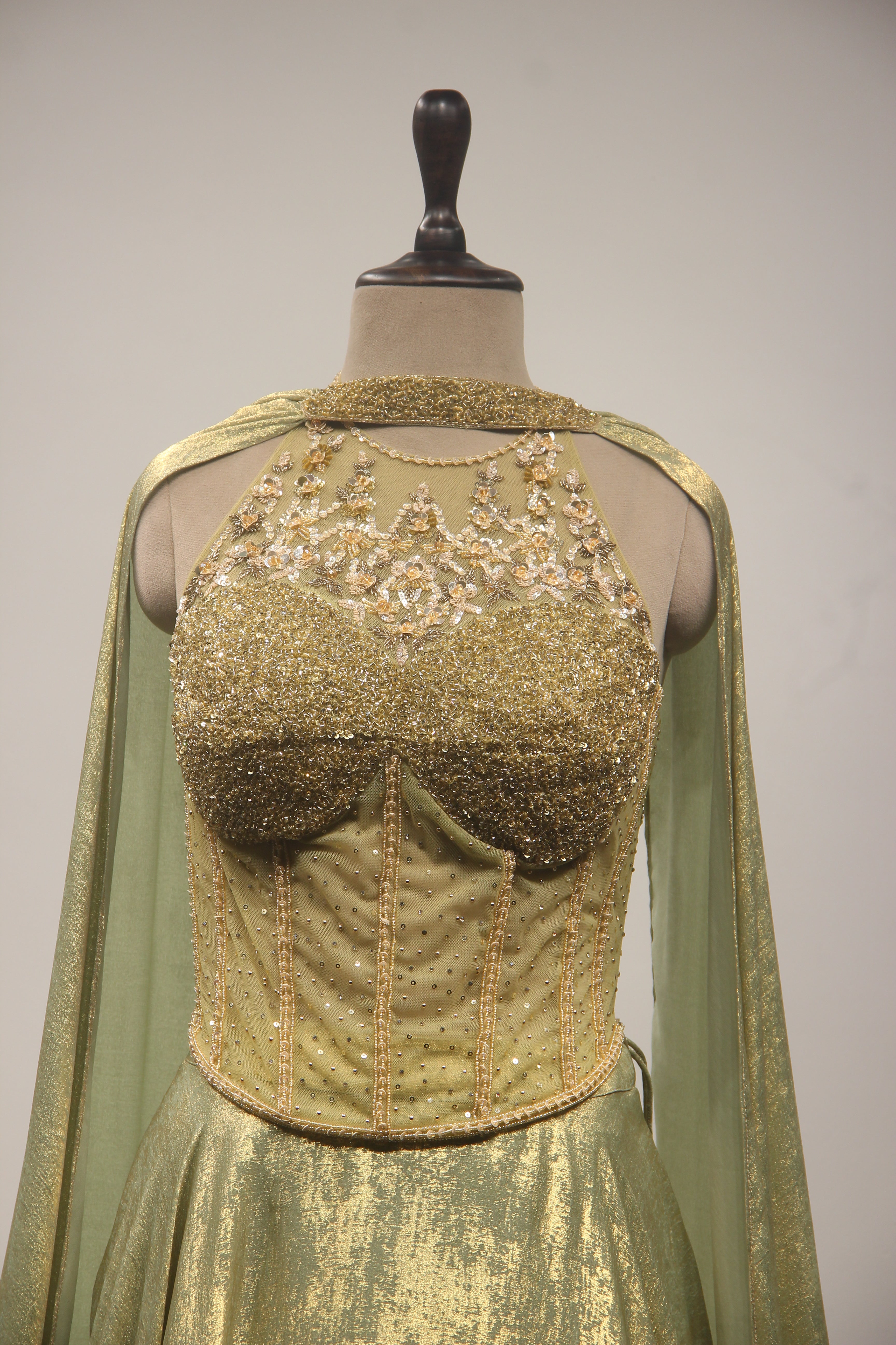 Simmer Lehenga with Halter Corset Blouse & Cut Dana Handwork