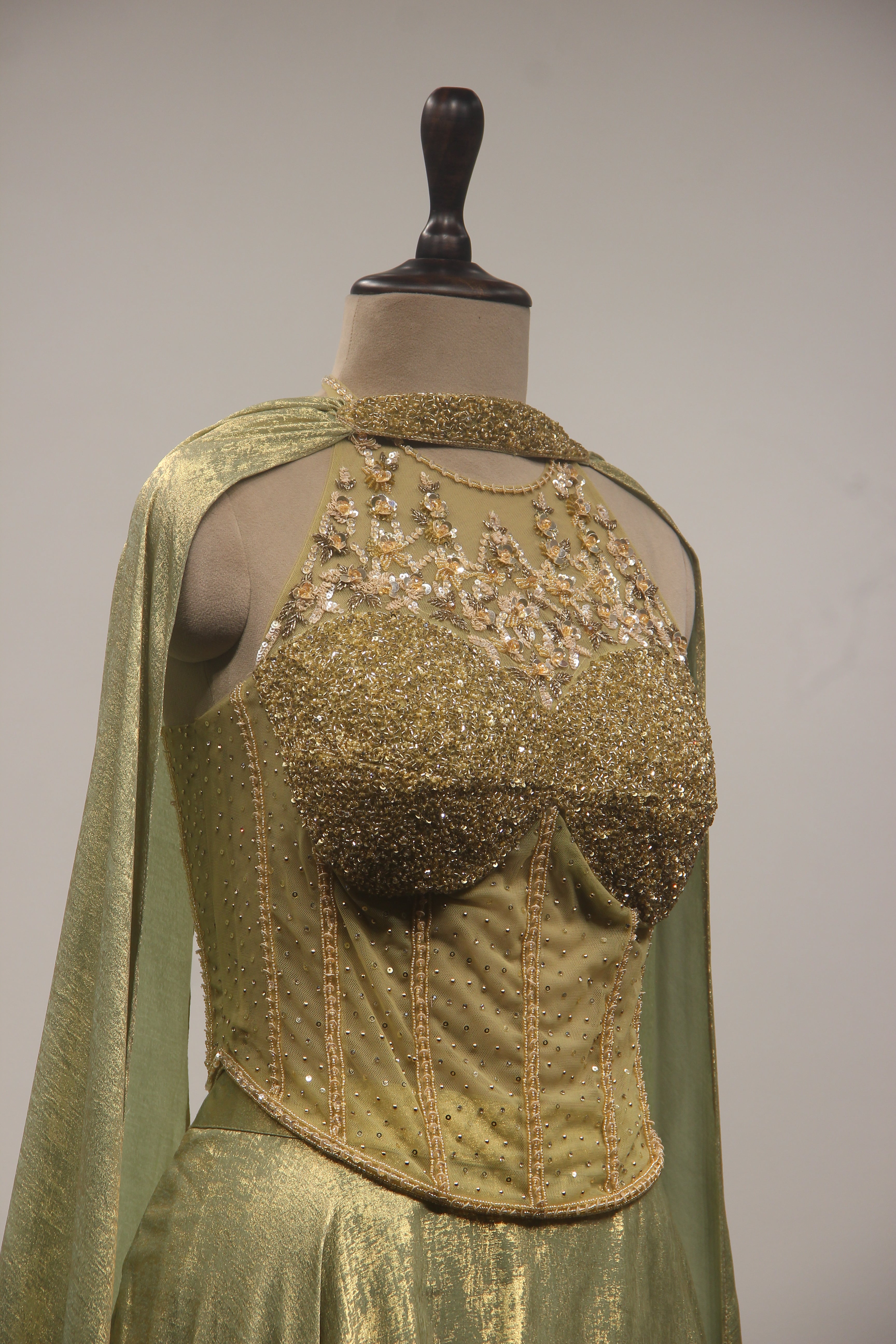 Simmer Lehenga with Halter Corset Blouse & Cut Dana Handwork
