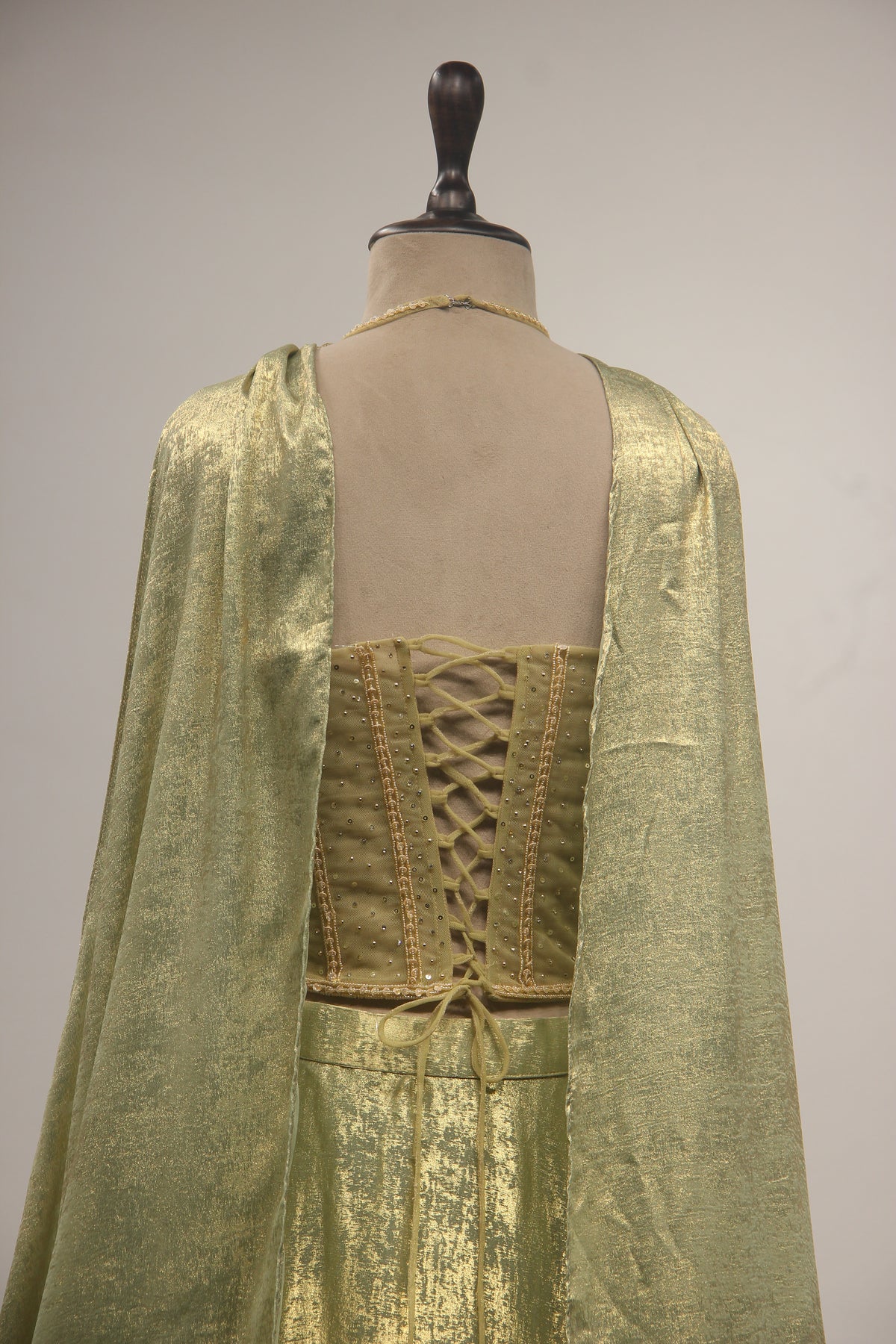 Simmer Lehenga with Halter Corset Blouse & Cut Dana Handwork