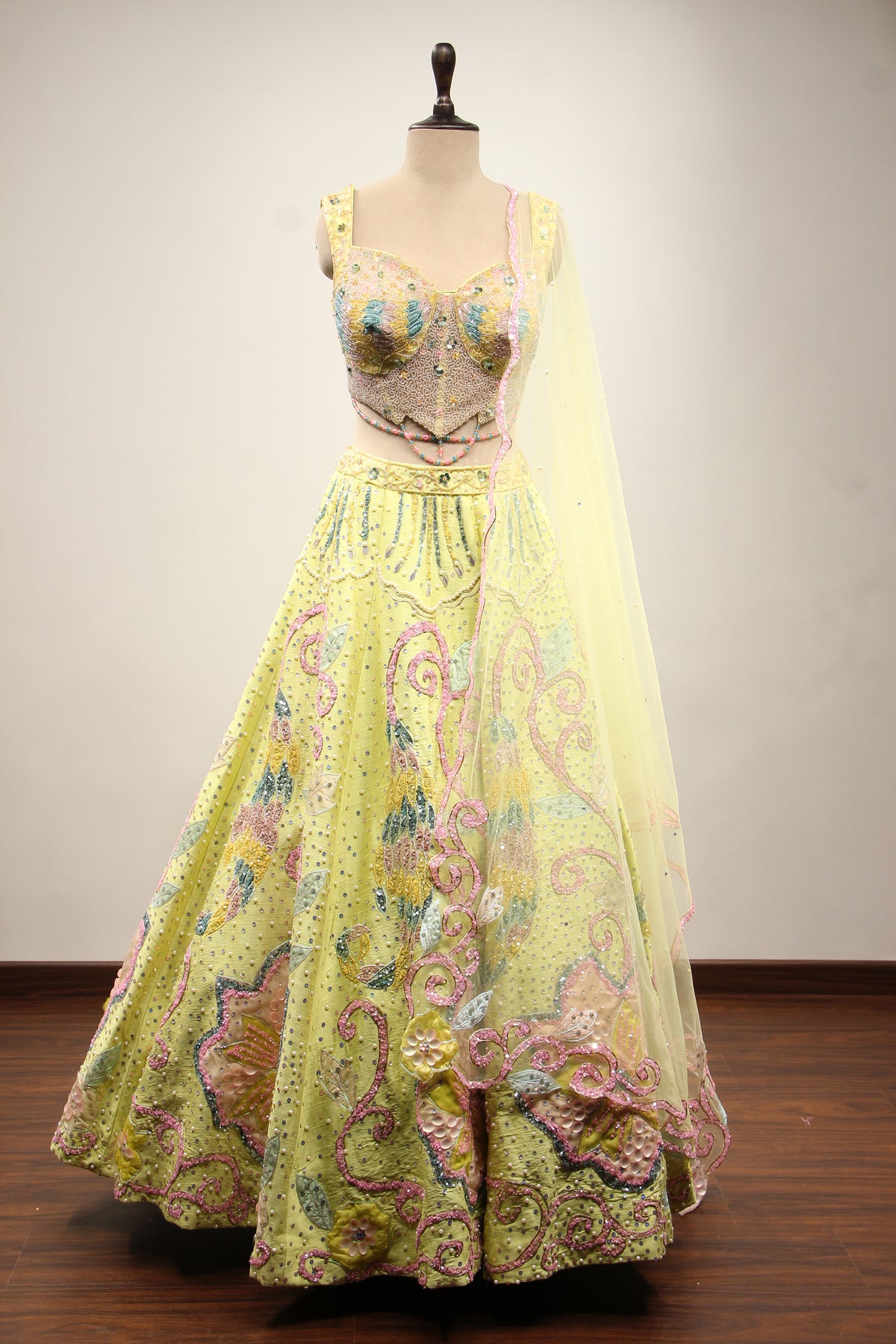 Pista Green Dupion Lehenga with Mirror & Cut Dana Handwork Net Corset – front view