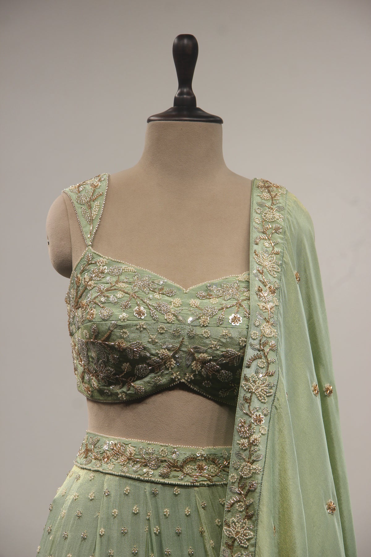 Pista Green Tissue Lehenga with Cut Dana & Bead Handwork Crop Top